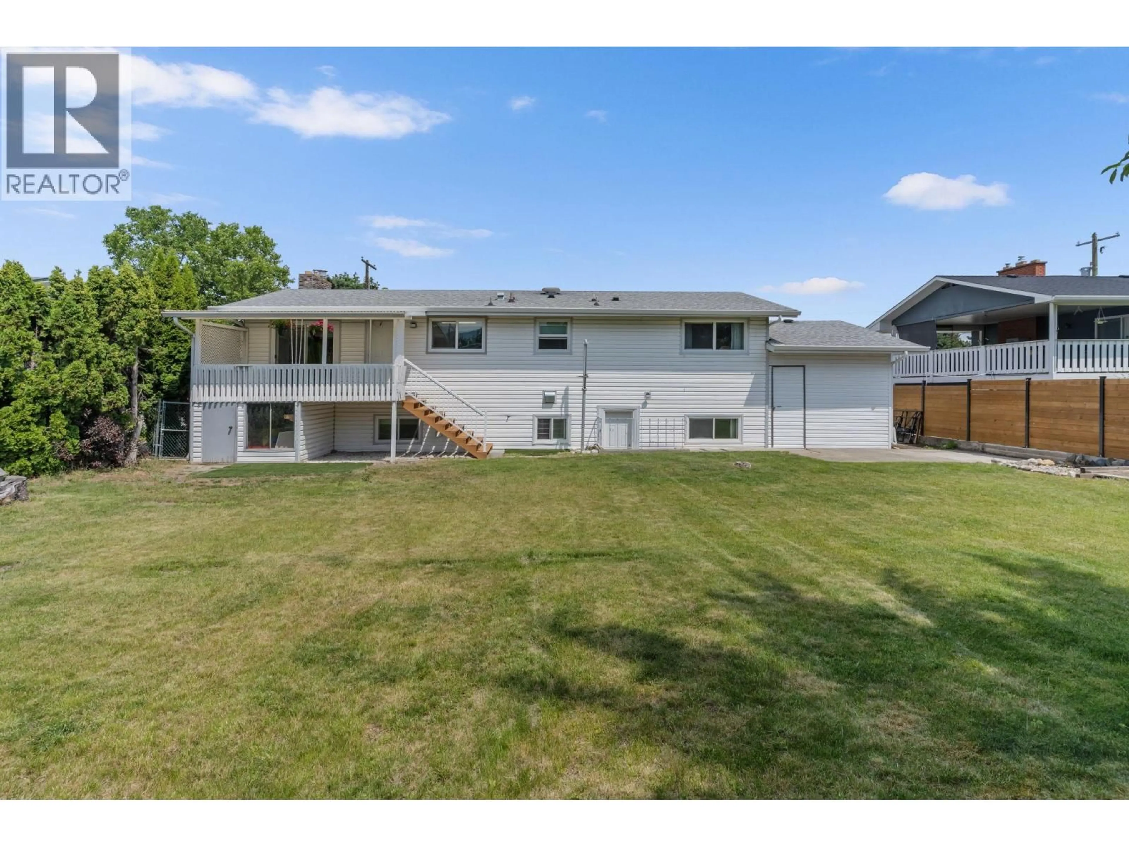 A pic from outside/outdoor area/front of a property/back of a property/a pic from drone, unknown for 449 BARKLEY ROAD, Kelowna British Columbia V1W1E4