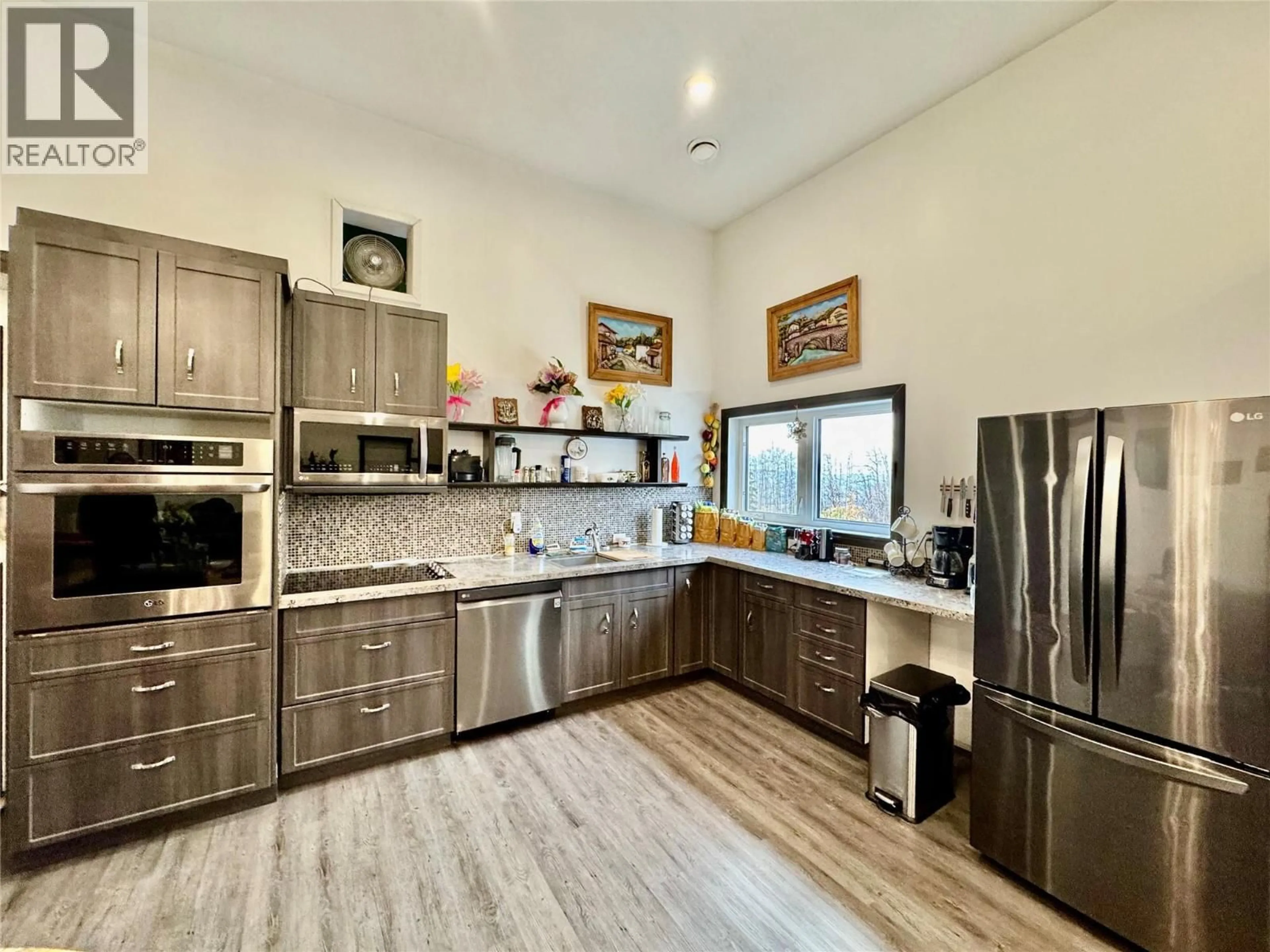 Open concept kitchen, ceramic/tile floor for 227 PATTERSON ROAD, Dawson Creek British Columbia V0C2C0