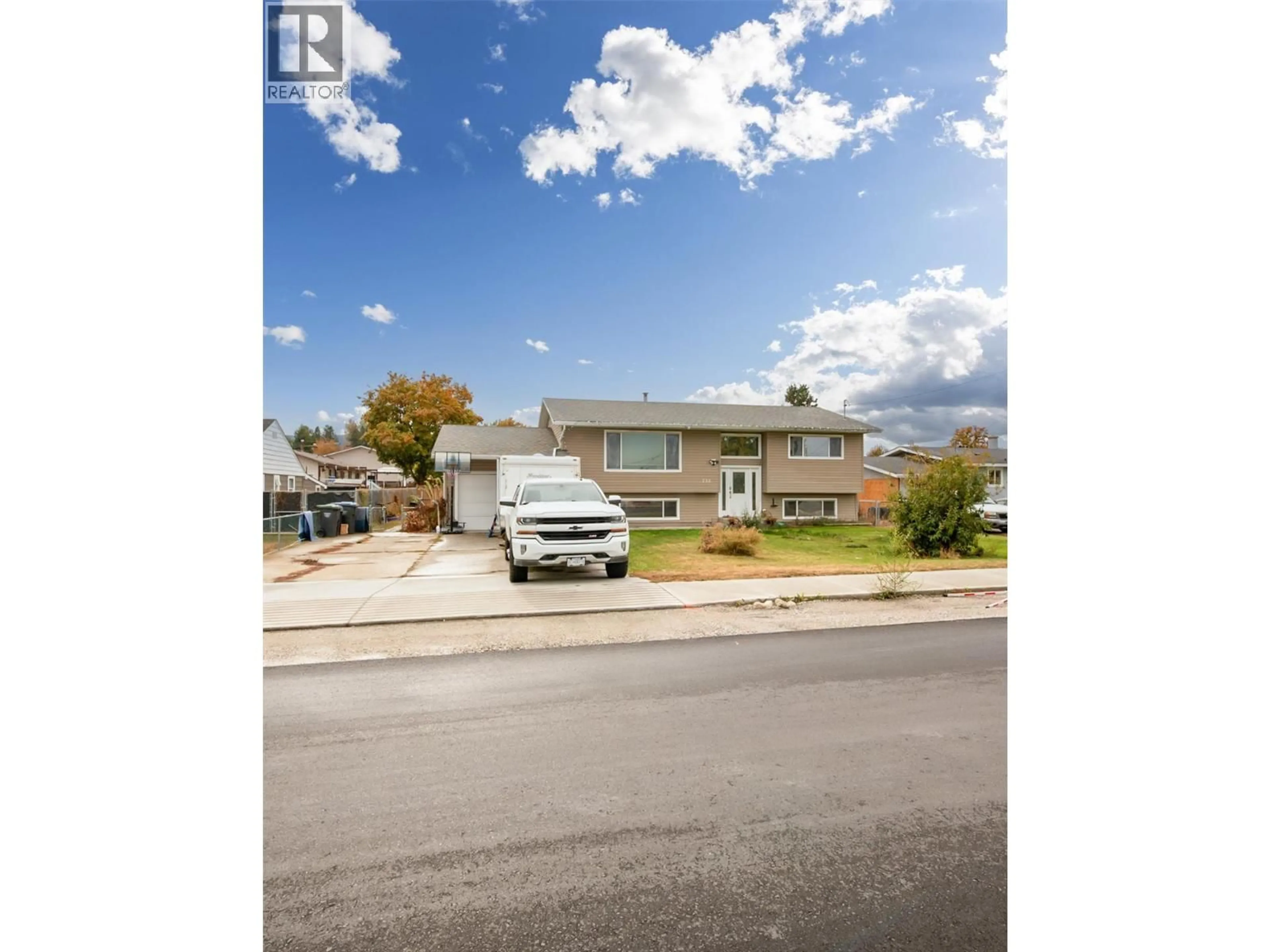 A pic from outside/outdoor area/front of a property/back of a property/a pic from drone, street for 735 BELGO ROAD, Kelowna British Columbia V1X3A6