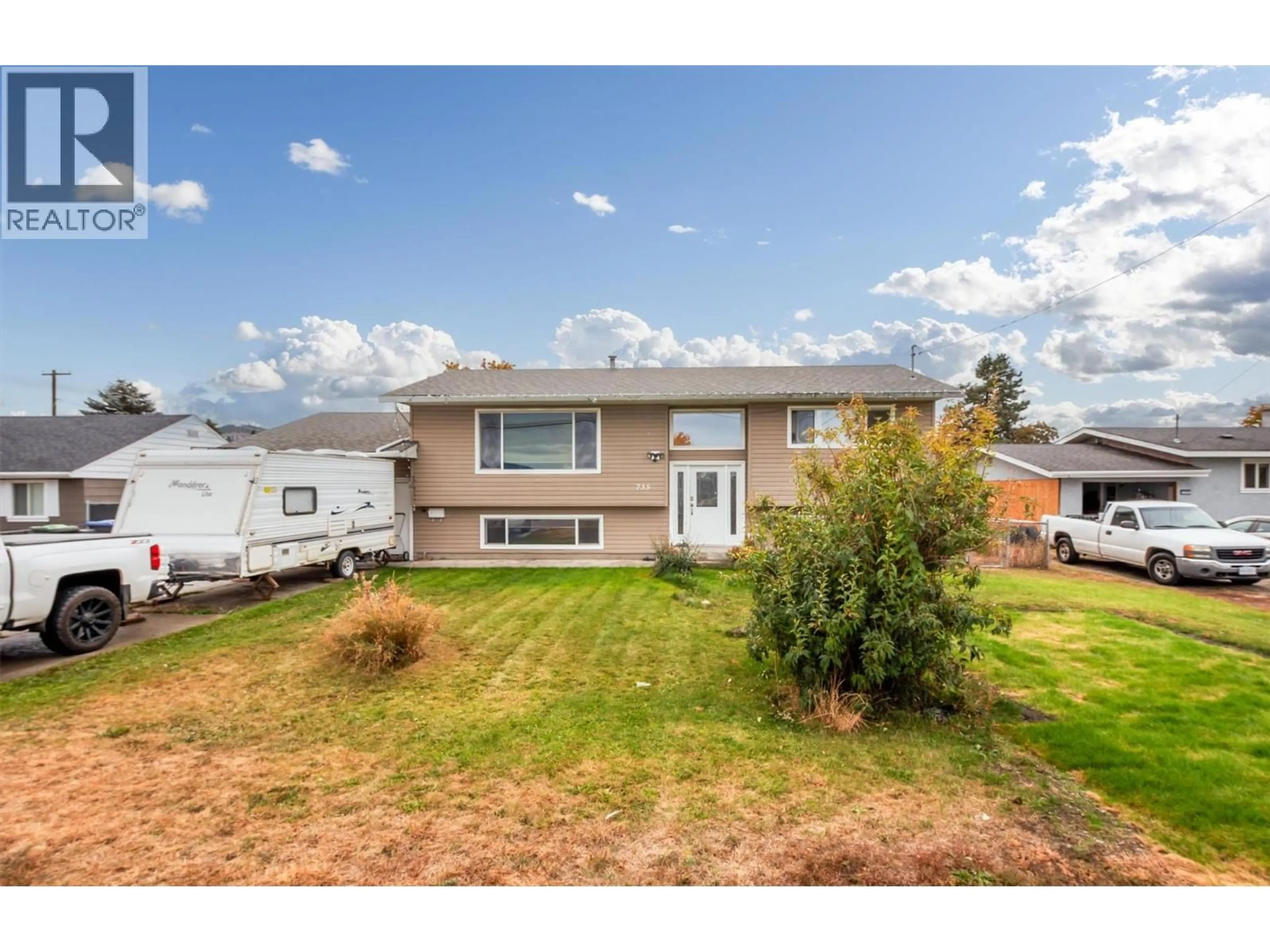 A pic from outside/outdoor area/front of a property/back of a property/a pic from drone, unknown for 735 BELGO ROAD, Kelowna British Columbia V1X3A6