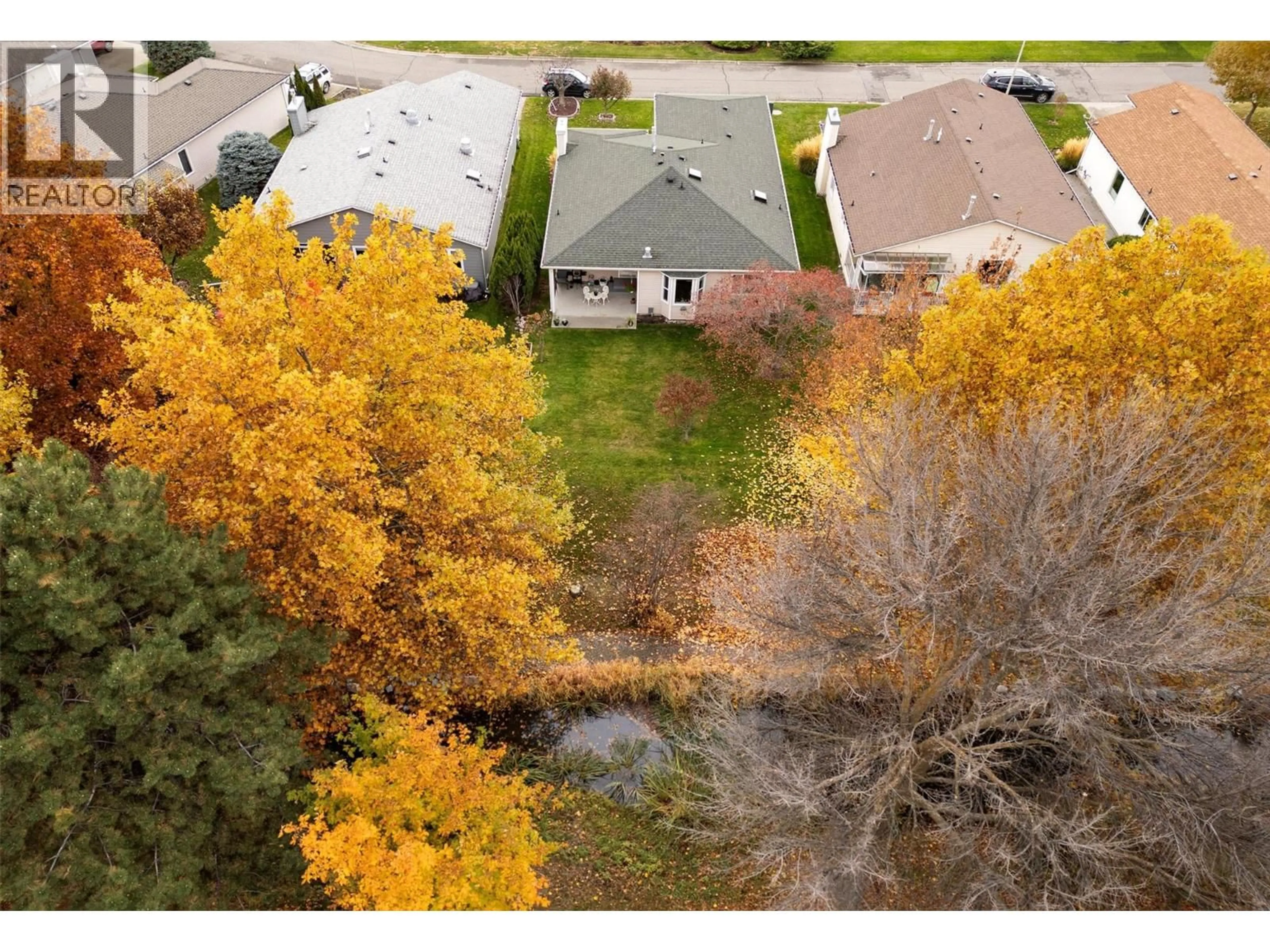 A pic from outside/outdoor area/front of a property/back of a property/a pic from drone, forest/trees view for 369 - 1260 RAYMER AVENUE, Kelowna British Columbia V1W3S6