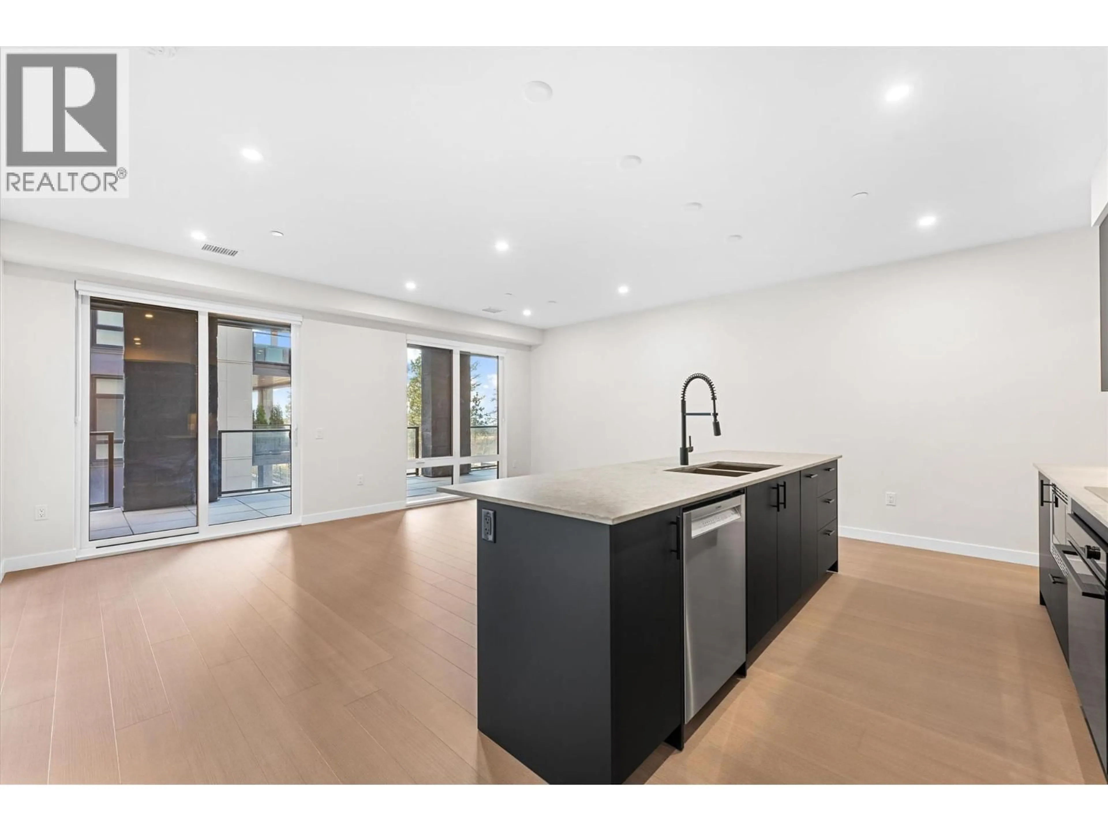 Open concept kitchen, unknown for 202 - 9654 BENCHLAND ROAD, Lake Country British Columbia V4V0A5