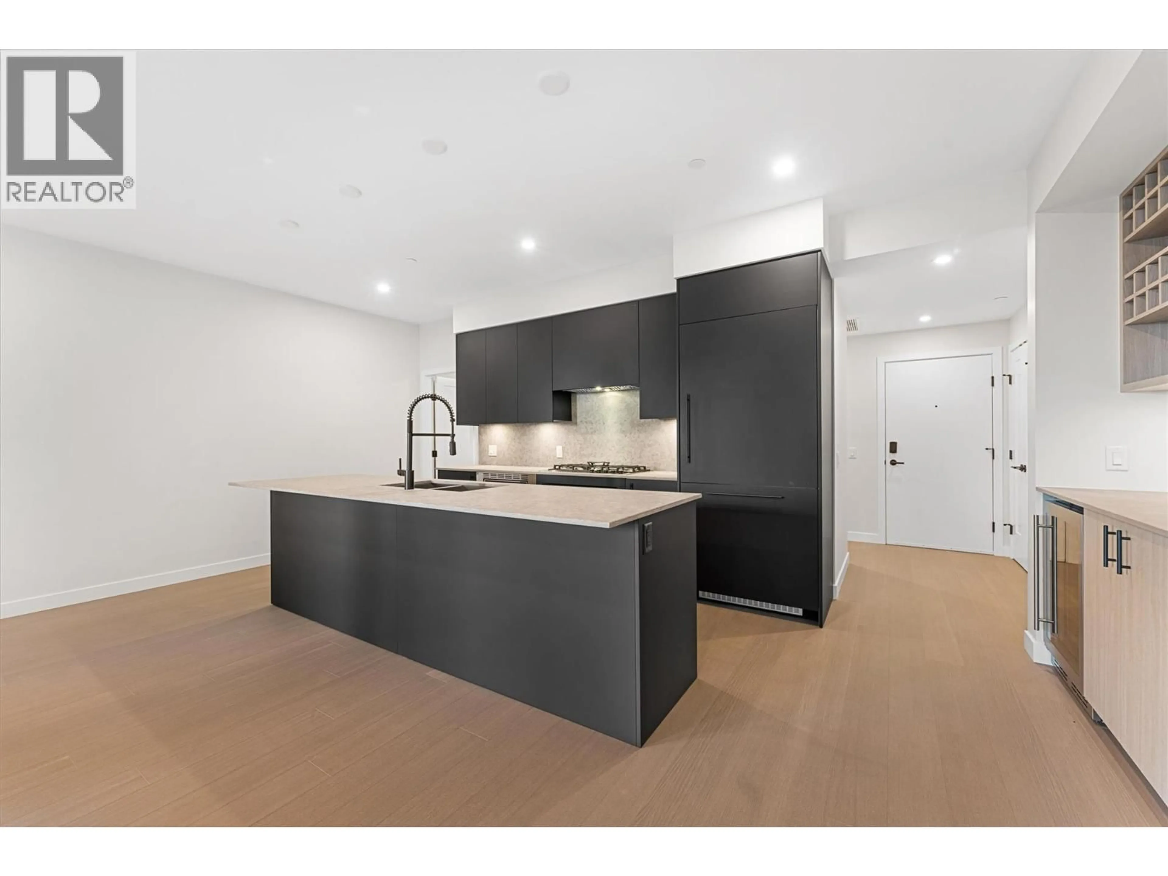 Open concept kitchen, unknown for 202 - 9654 BENCHLAND ROAD, Lake Country British Columbia V4V0A5