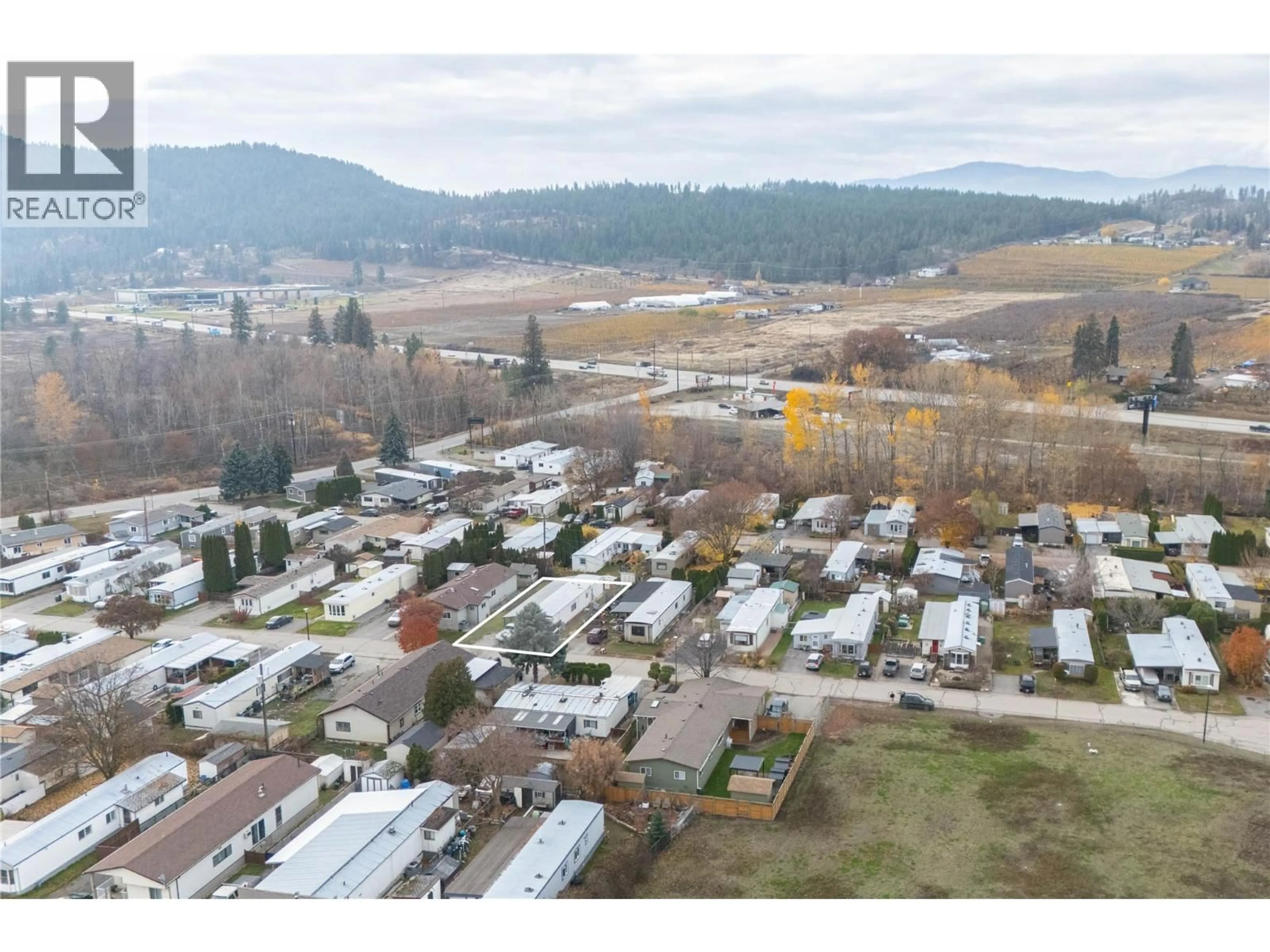 A pic from outside/outdoor area/front of a property/back of a property/a pic from drone, mountain view for 40 - 720 COMMONWEALTH ROAD, Kelowna British Columbia V4V1R6