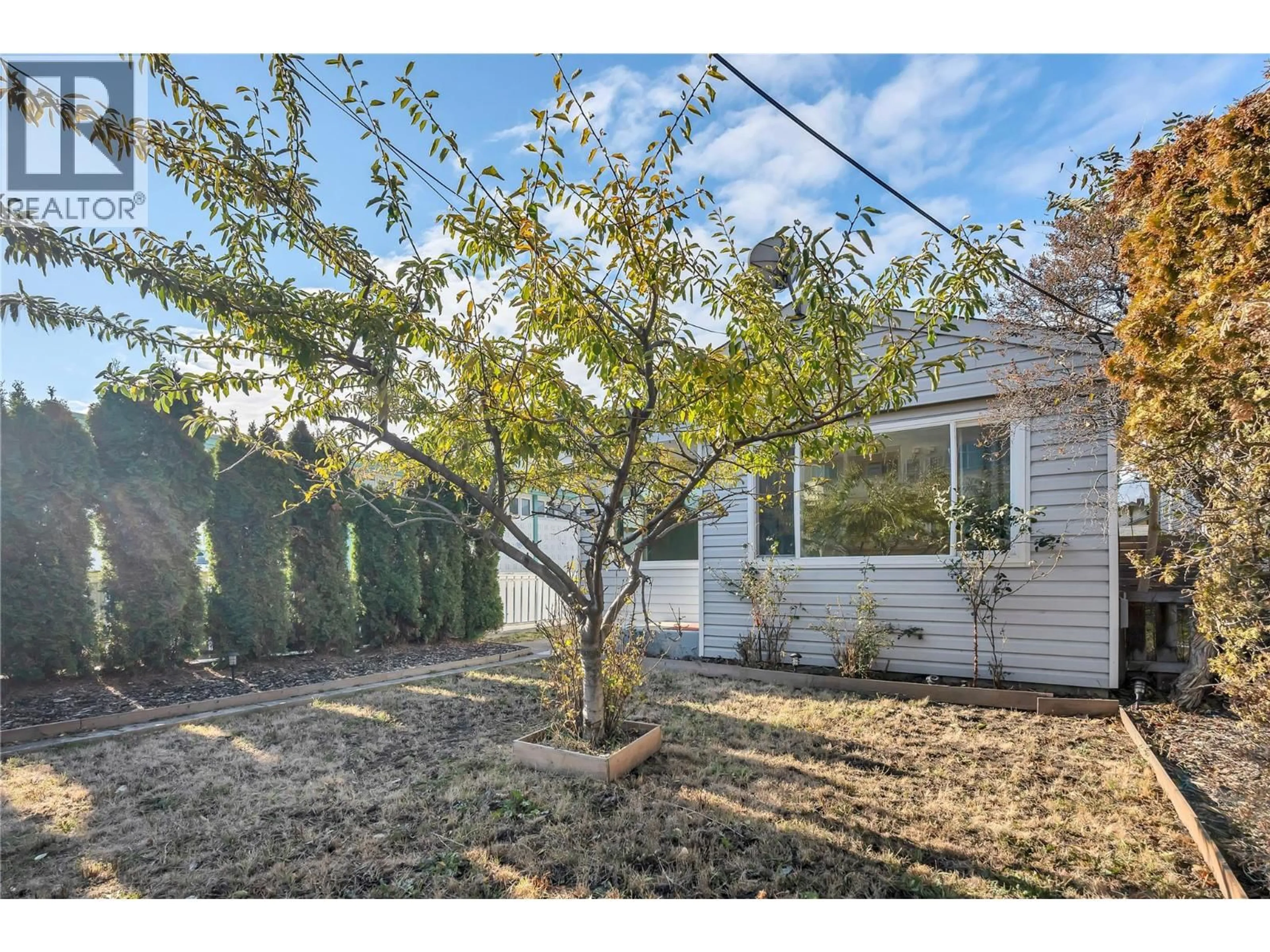 A pic from outside/outdoor area/front of a property/back of a property/a pic from drone, street for 389 BRUNSWICK STREET, Penticton British Columbia V2A5R2