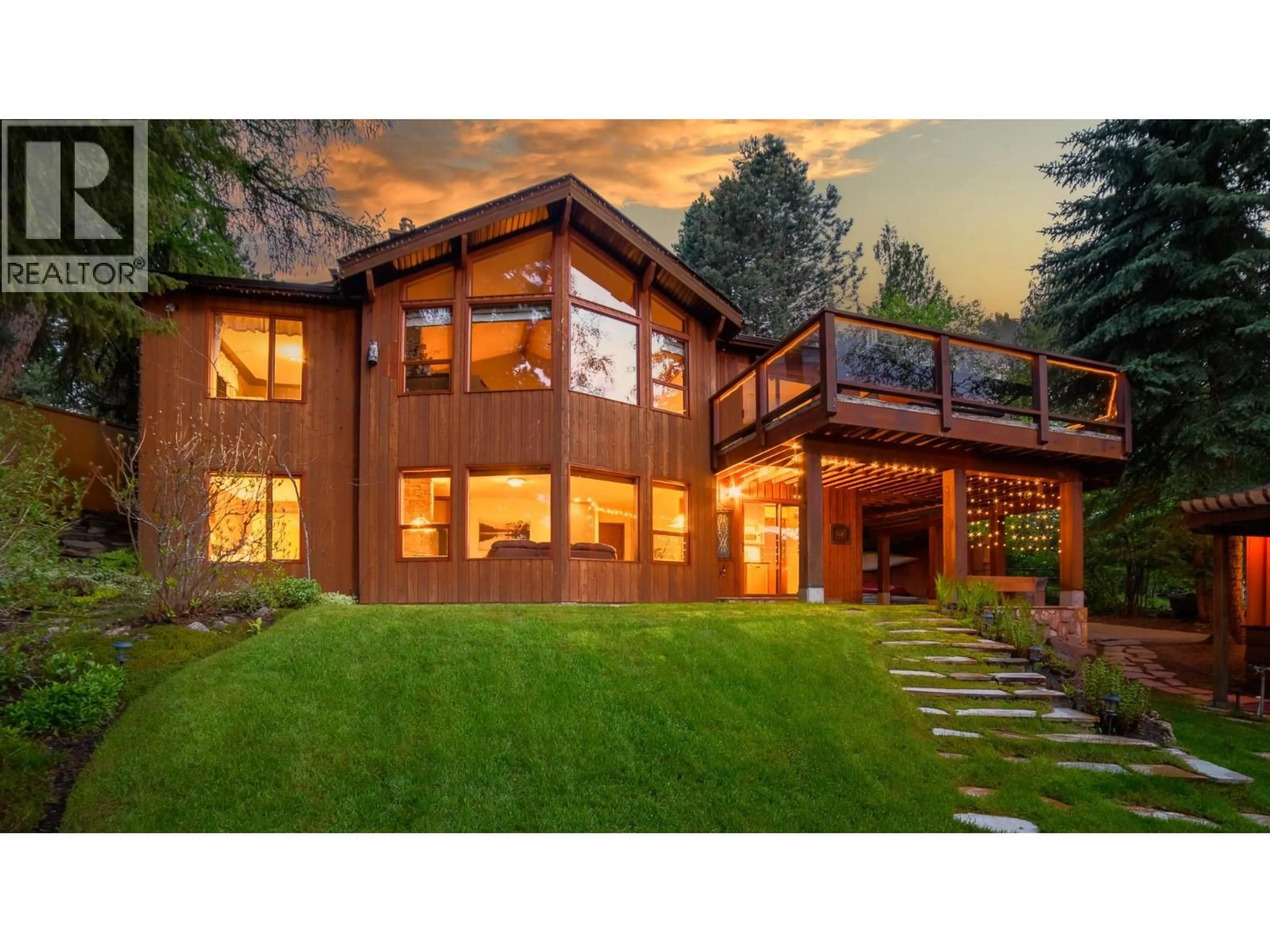 Home with brick exterior material, mountain view for 102 SANDNER ROAD, Christina Lake British Columbia V0H1E0