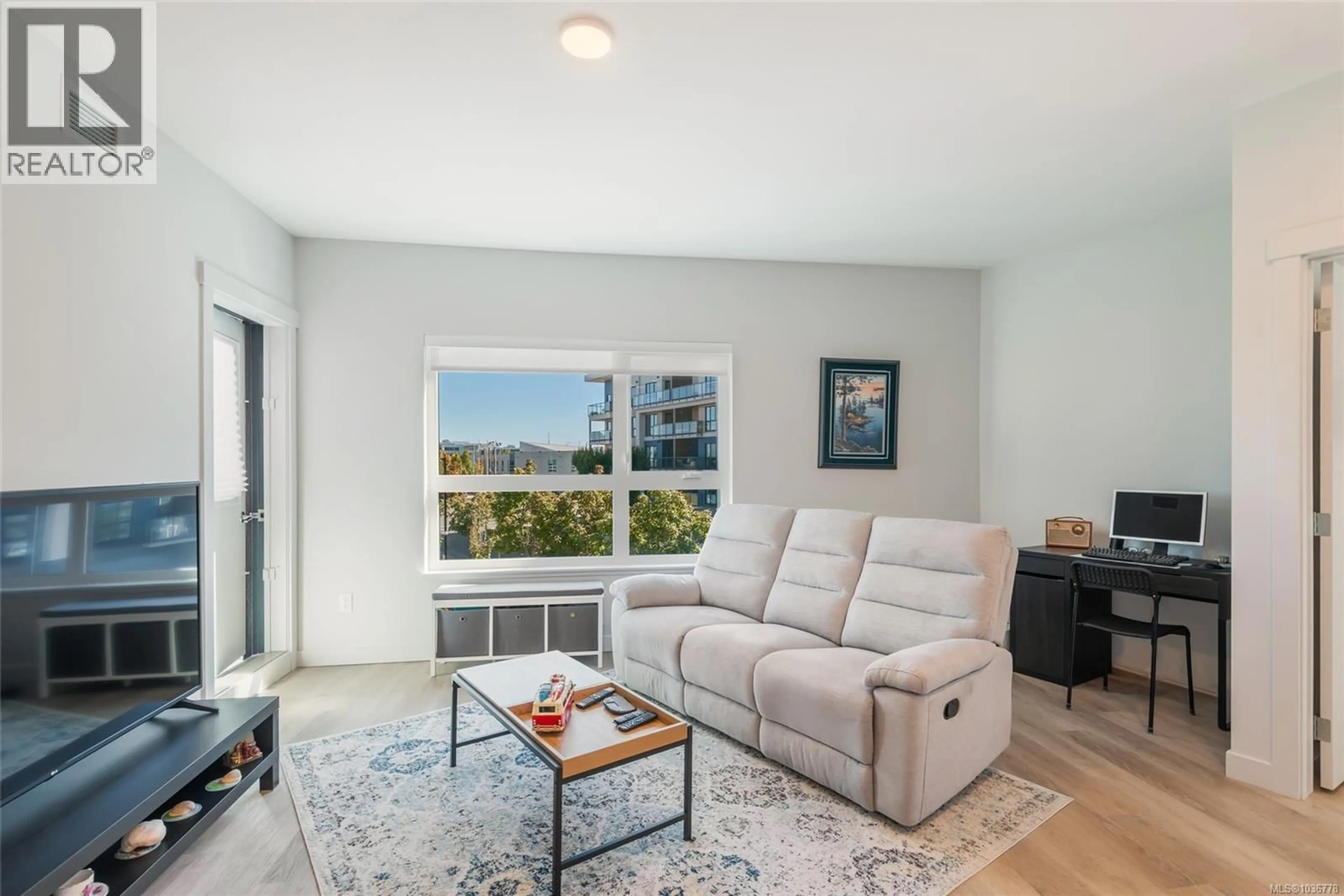 Living room with furniture, unknown for 204 - 164 ALBERNI HIGHWAY, Parksville British Columbia V9P1L9