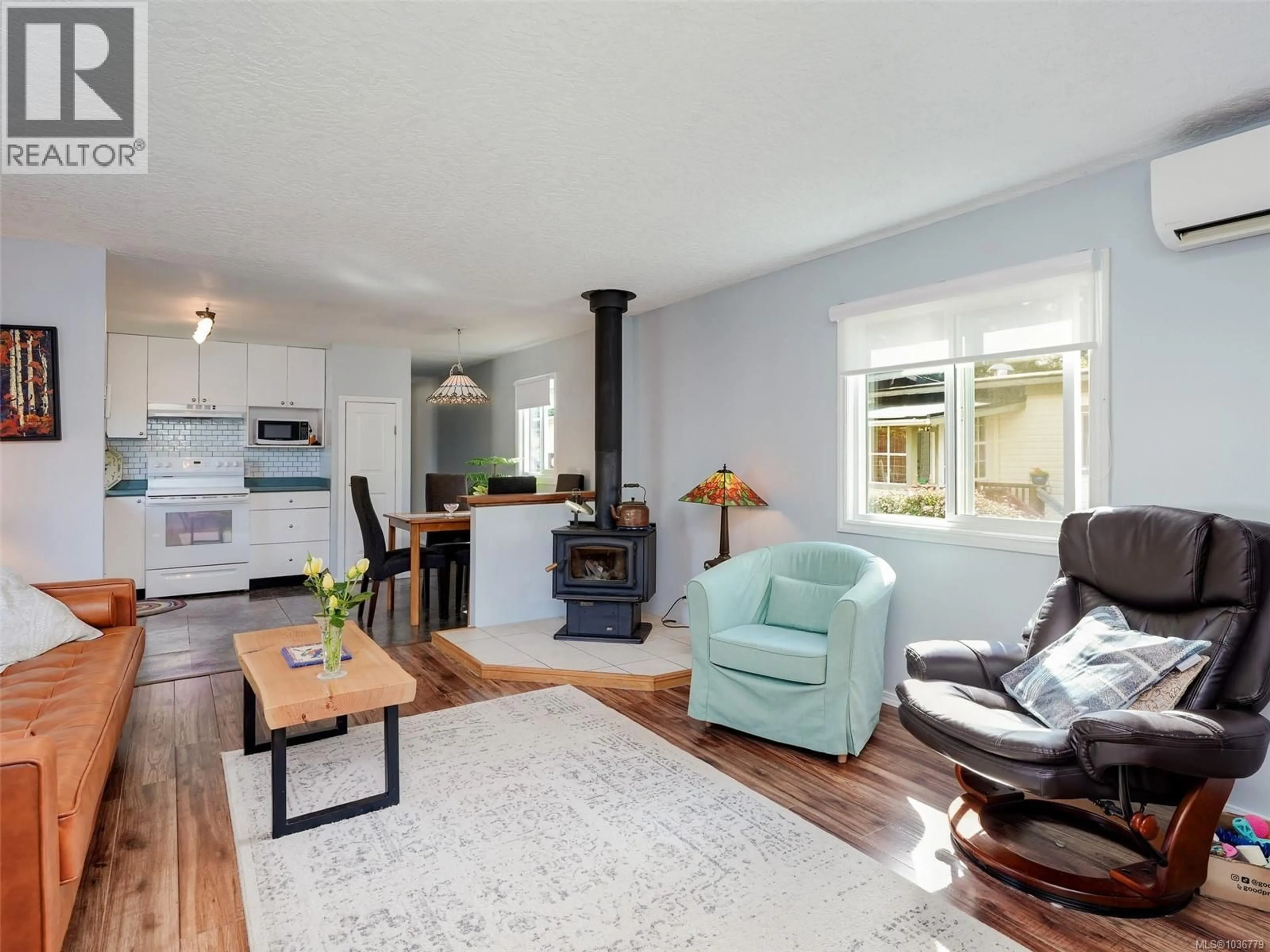 Living room with furniture, wood/laminate floor for 29 - 6947 GRANT ROAD WEST, Sooke British Columbia V9Z0P2