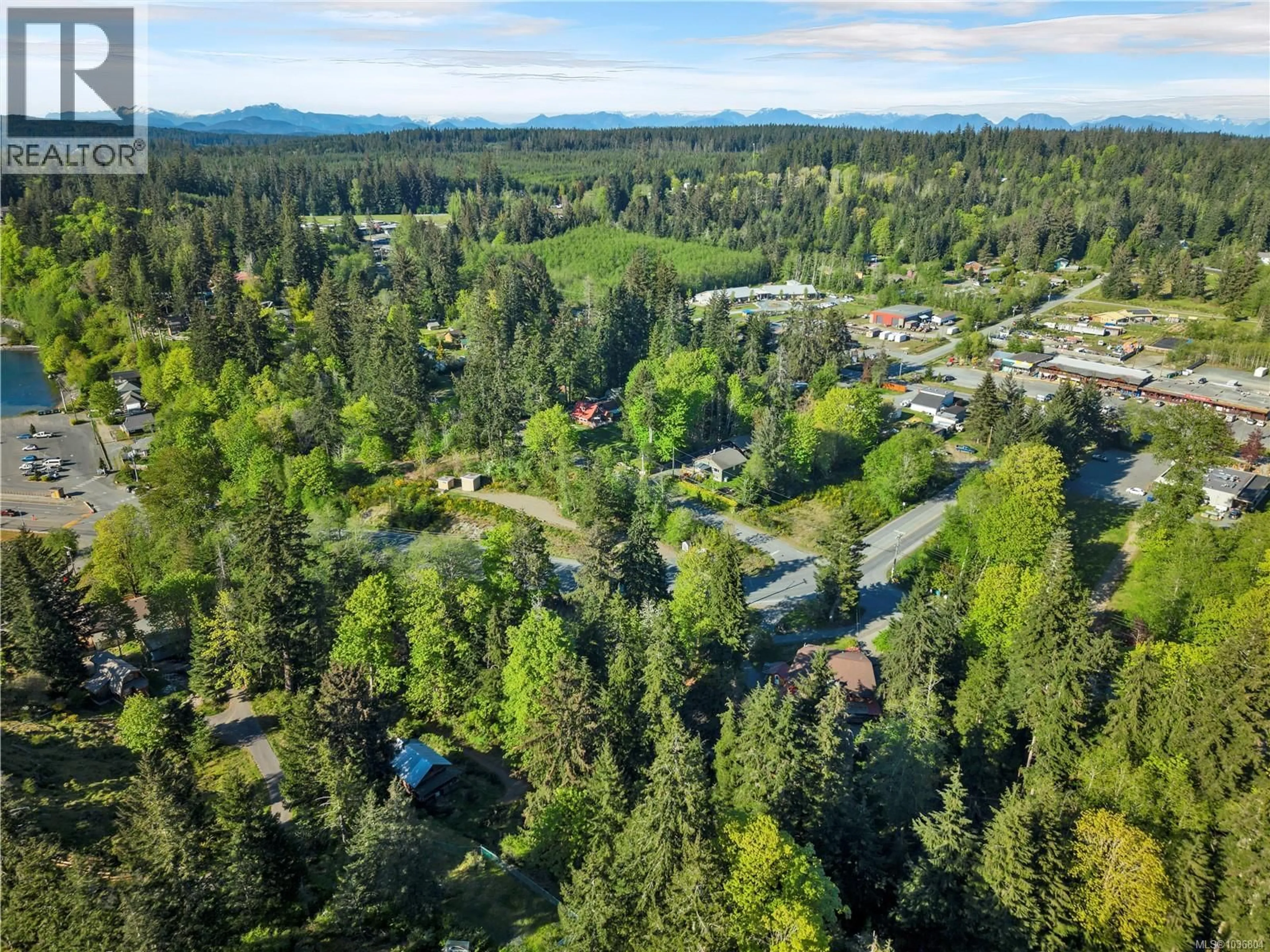 A pic from outside/outdoor area/front of a property/back of a property/a pic from drone, forest/trees view for 653 GREEN ROAD, Quadra Island British Columbia V0P1N0