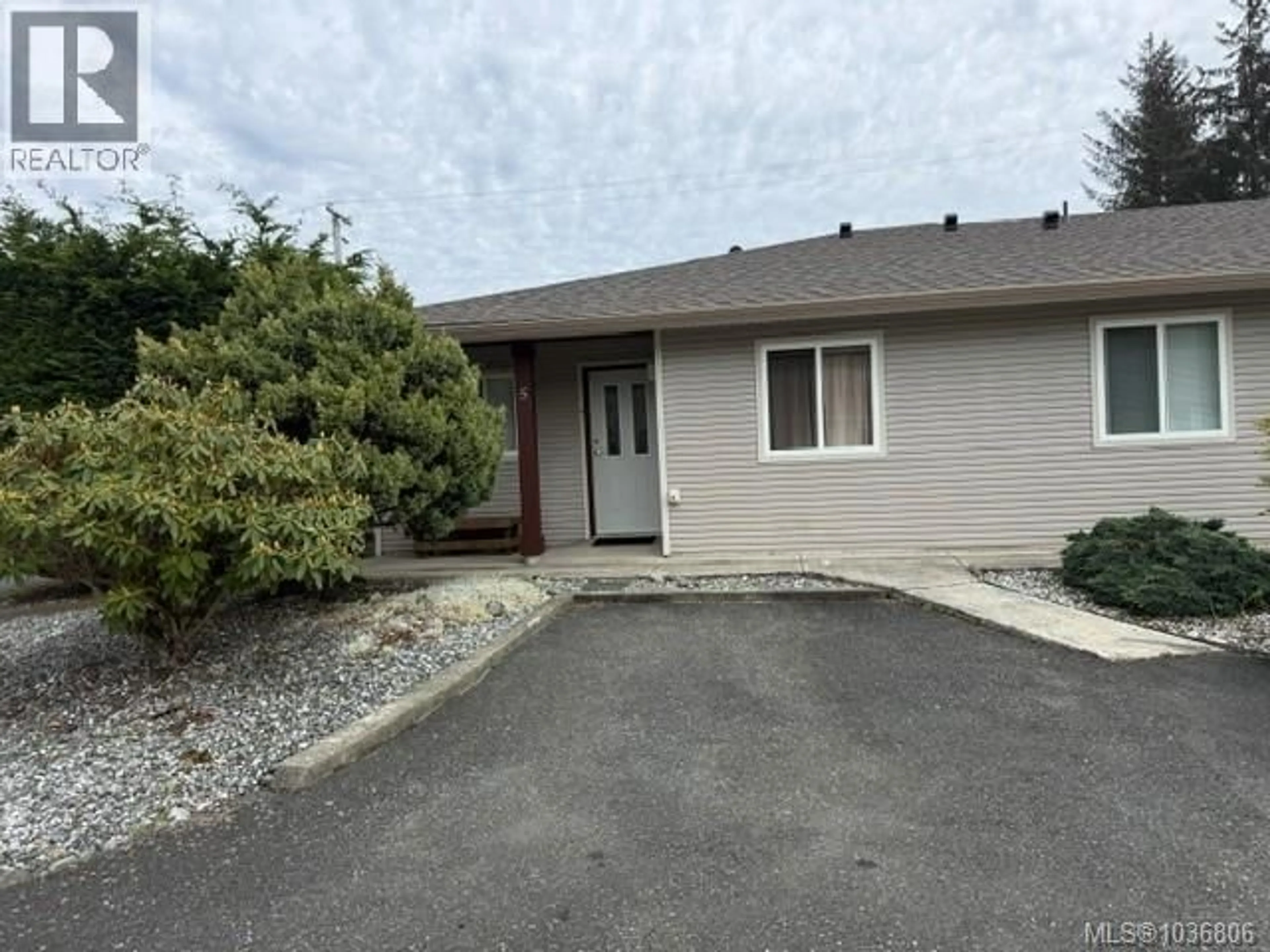 Home with vinyl exterior material, street for 5 - 7300 COLUMBIA STREET, Port Hardy British Columbia V0N2P0