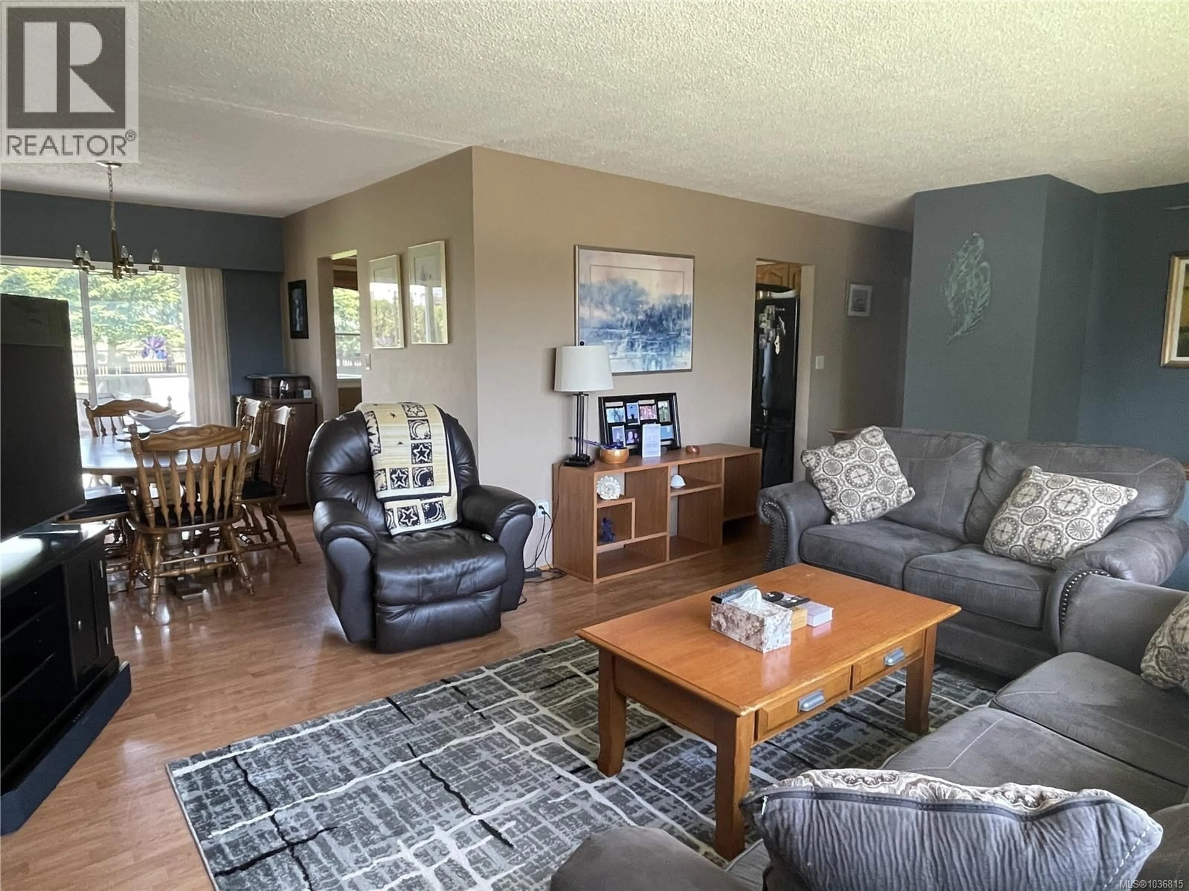 Living room with furniture, wood/laminate floor for 2617 10TH AVENUE, Port Alberni British Columbia V9Y2P2