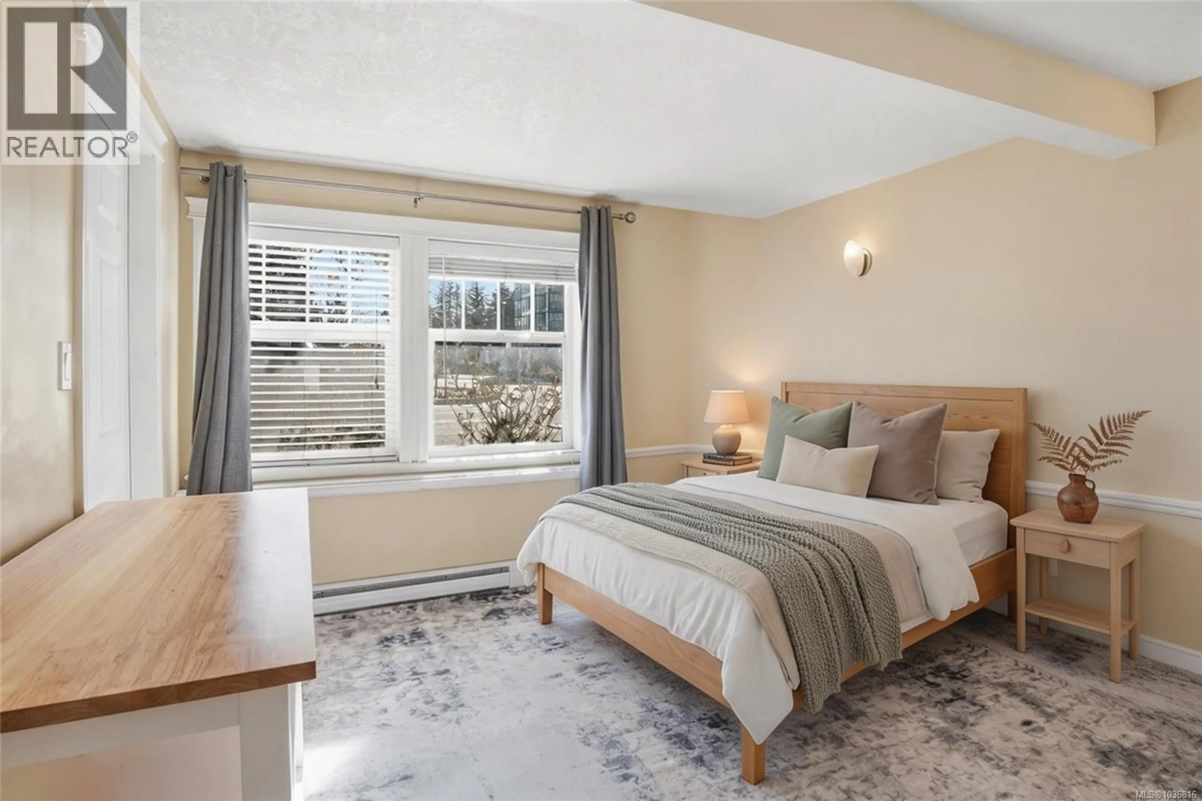 Bedroom with bed, unknown for 104 - 2766 PEATT ROAD, Langford British Columbia V9B3V3