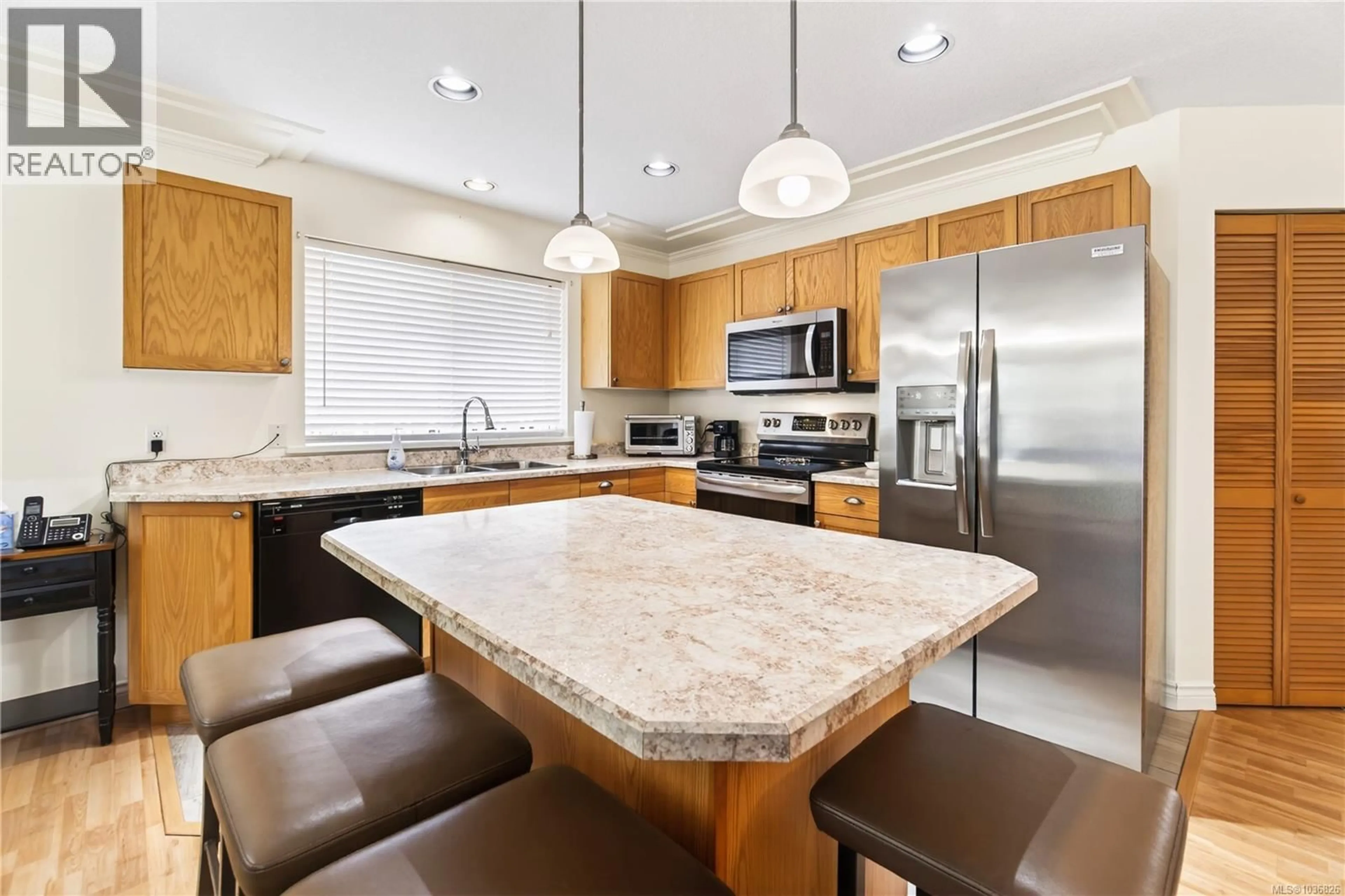 Open concept kitchen, ceramic/tile floor for 6056 GARSIDE ROAD, Nanaimo British Columbia V9T6H9
