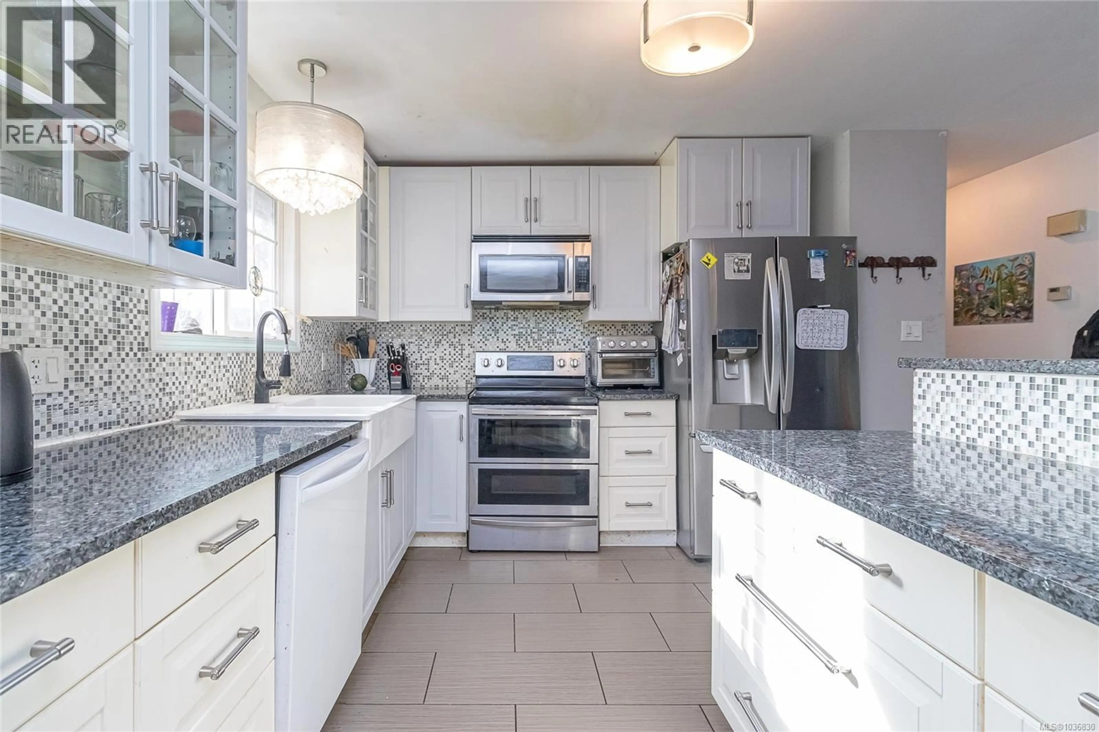 Contemporary kitchen, ceramic/tile floor for 6343 FAIRVIEW WAY, Duncan British Columbia V9L3N2