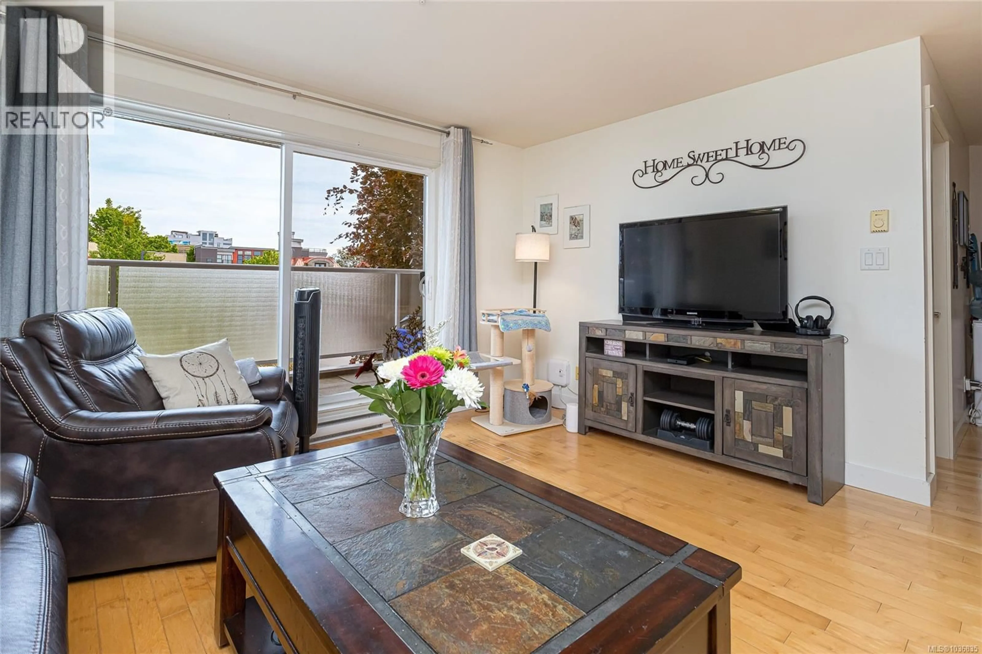 Living room with furniture, wood/laminate floor for 216 - 1315 ESQUIMALT ROAD, Esquimalt British Columbia V9A3P5
