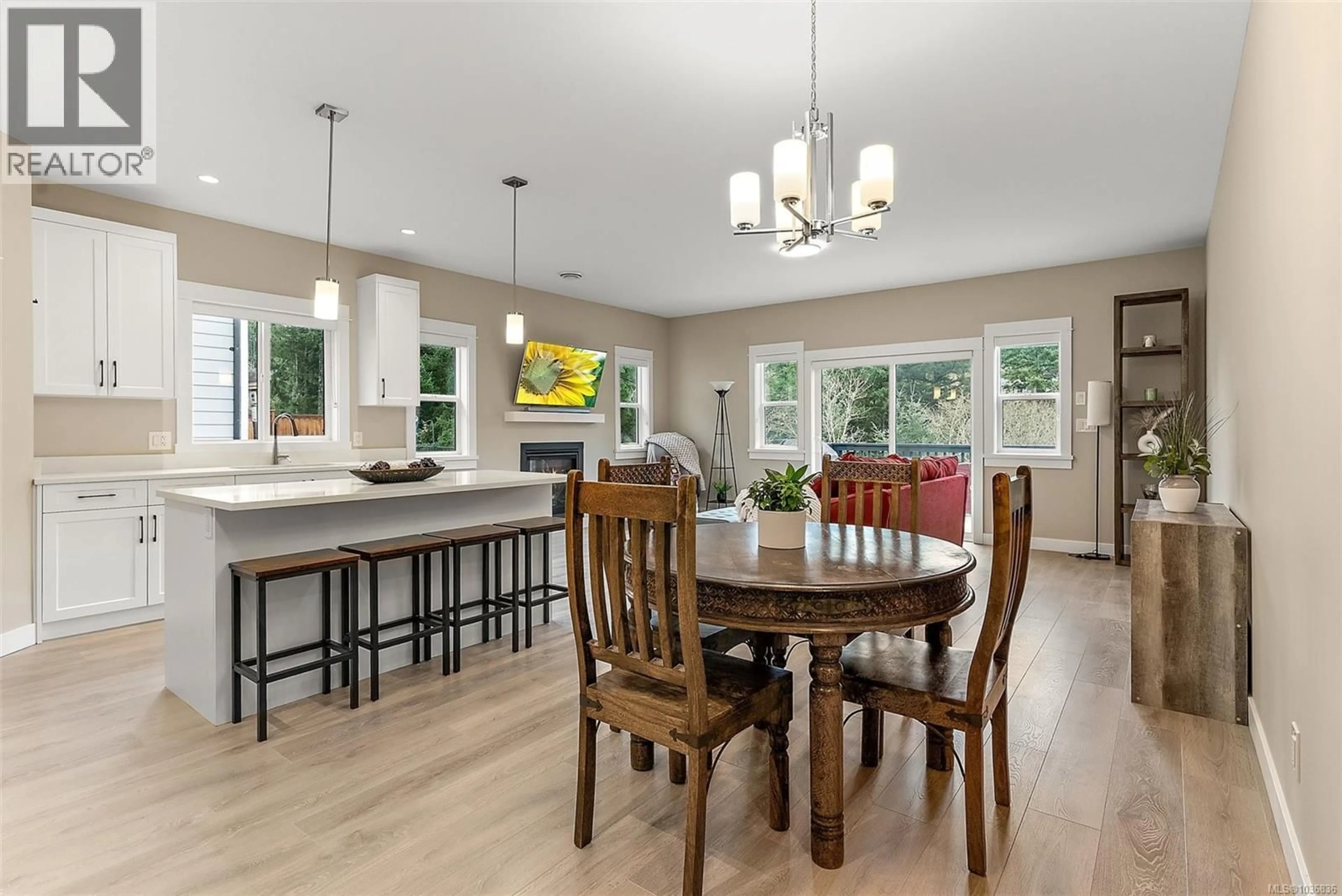 Open concept kitchen, wood/laminate floor for 933 BLAKEON PLACE, Langford British Columbia V9C0R3