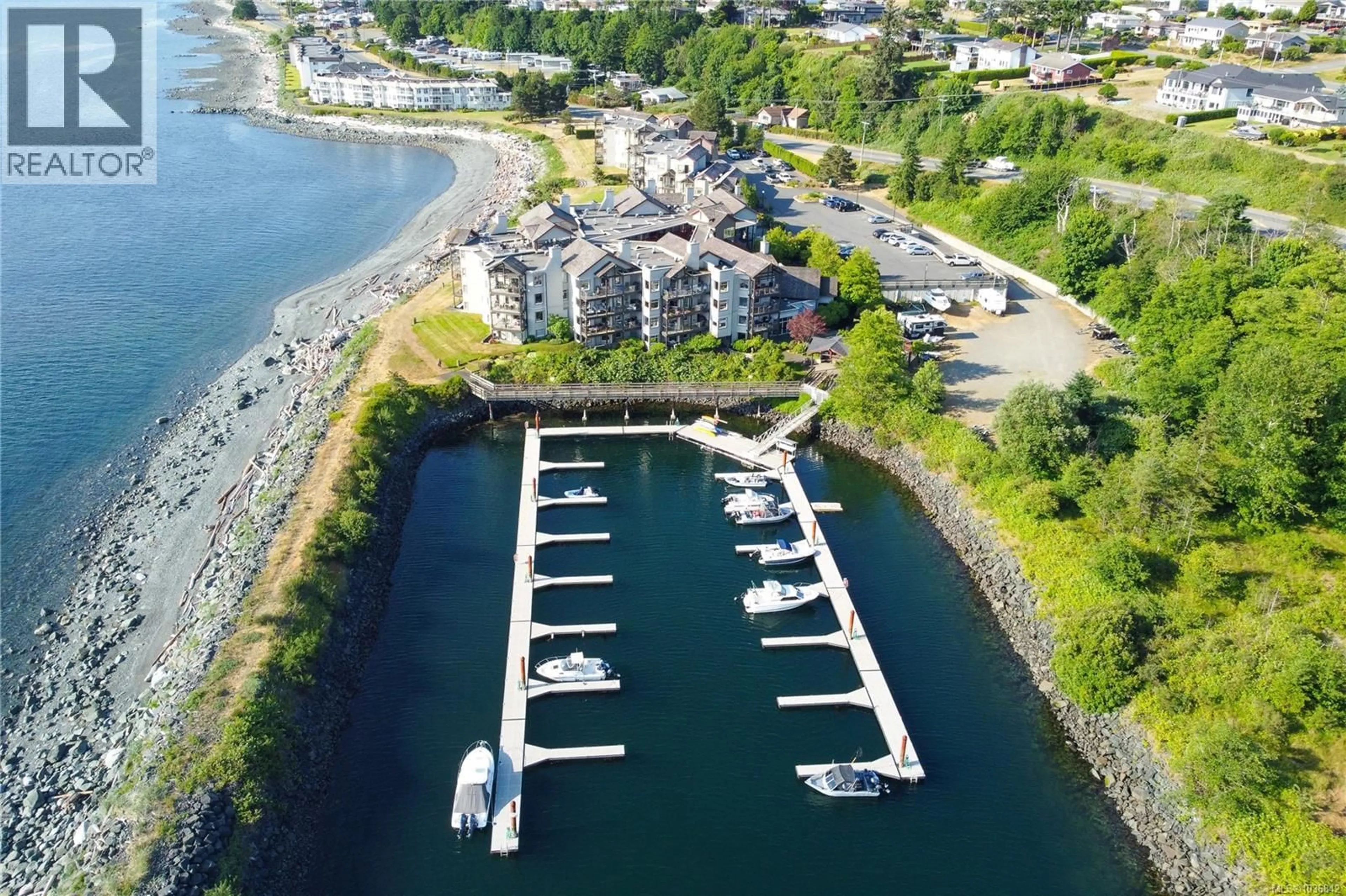 A pic from outside/outdoor area/front of a property/back of a property/a pic from drone, water/lake/river/ocean view for 2203 - 27 ISLAND HIGHWAY SOUTH, Campbell River British Columbia V9W1A2