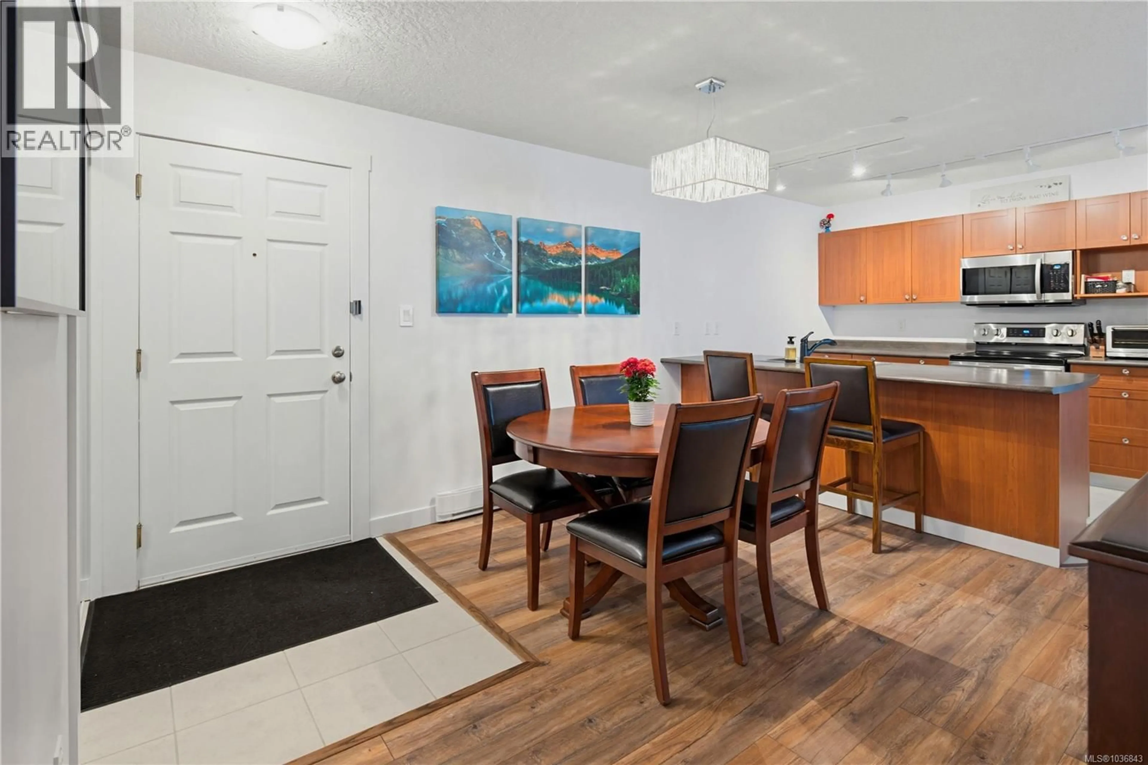 Dining room, wood/laminate floor for 205 - 2823 JACKLIN ROAD, Langford British Columbia V9B3Y1