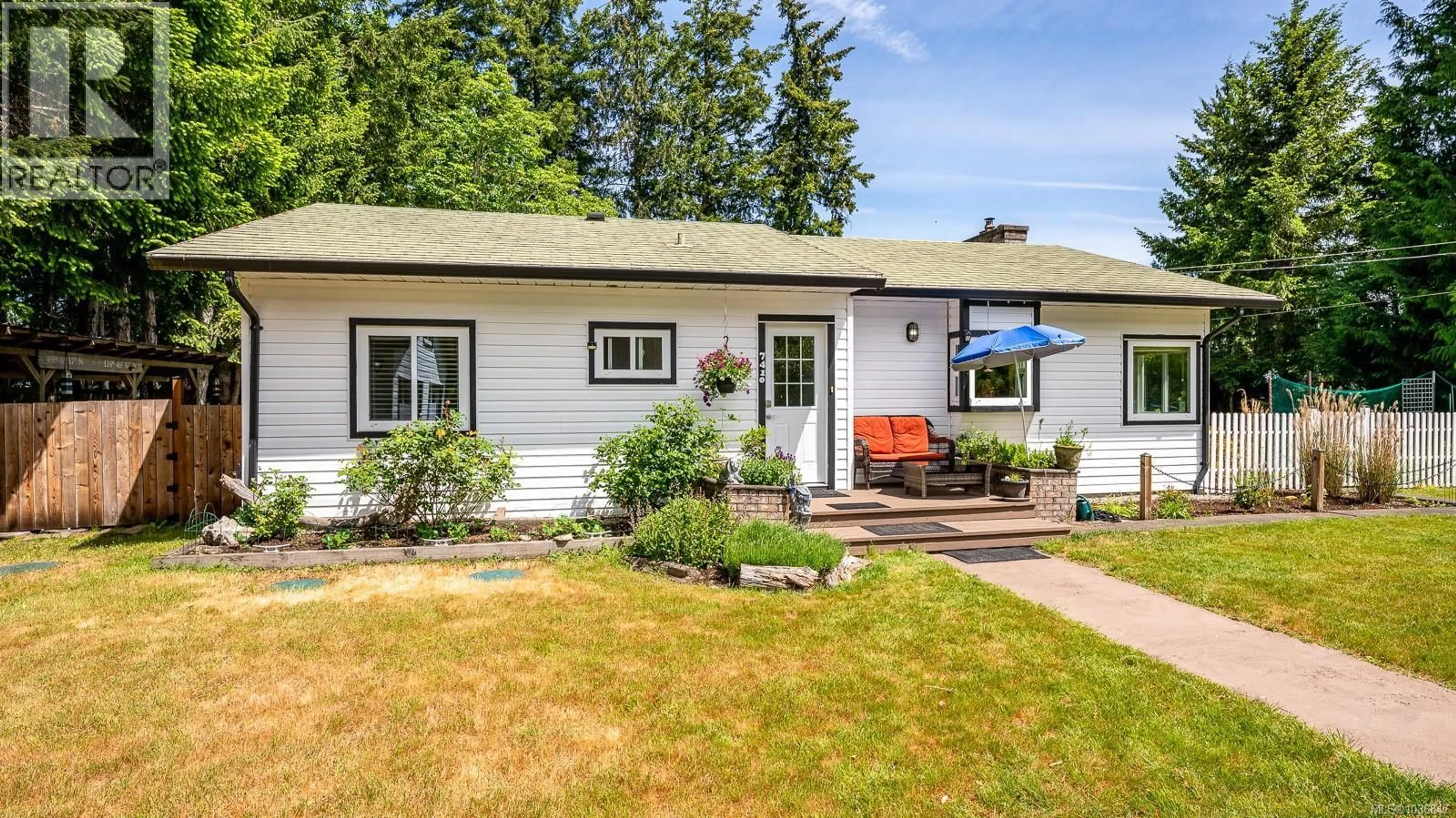 Home with vinyl exterior material, street for 7410 YAKE ROAD, Fanny Bay British Columbia V0R1W0