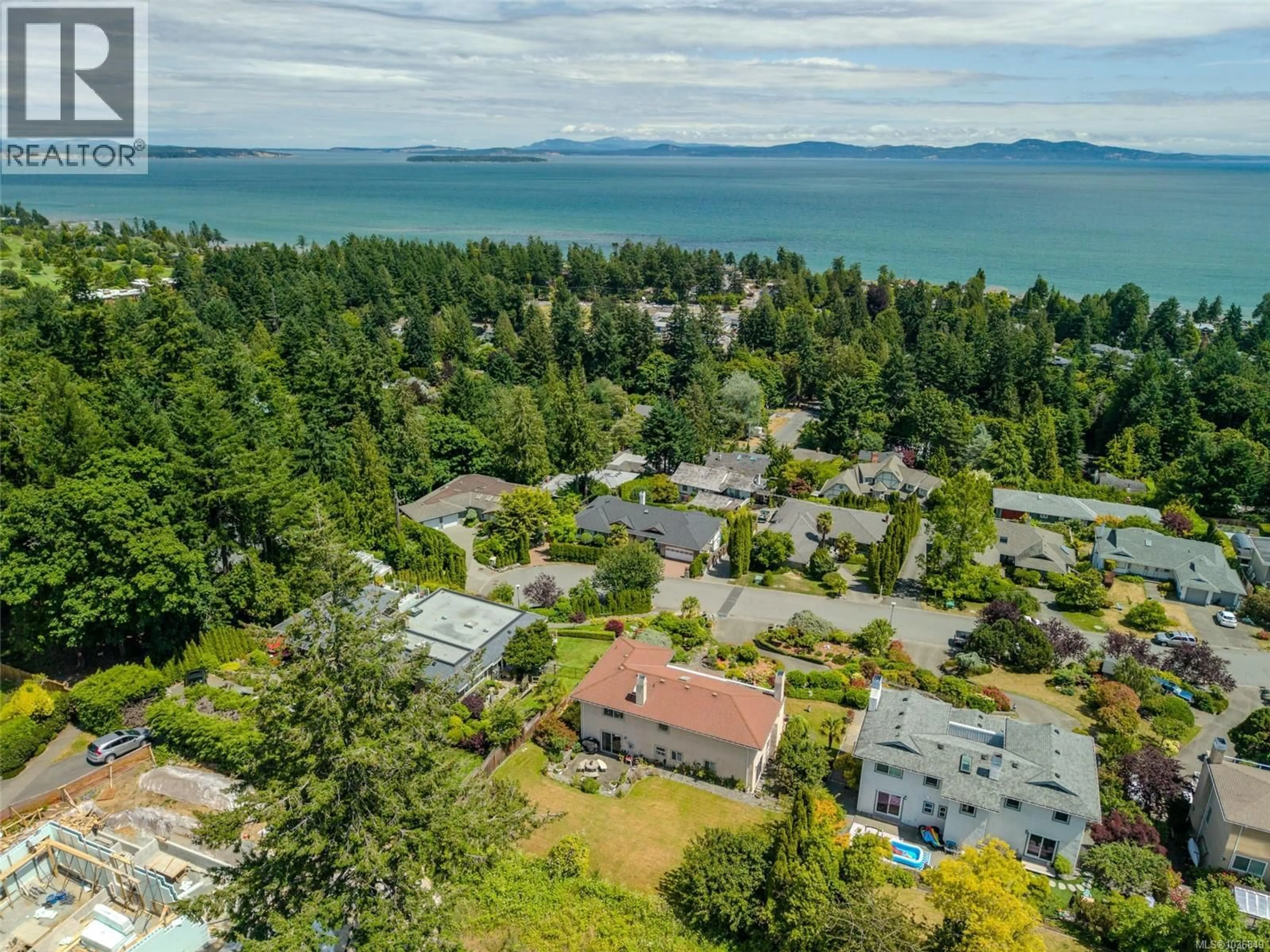 A pic from outside/outdoor area/front of a property/back of a property/a pic from drone, water/lake/river/ocean view for 5200 POLSON TERRACE, Saanich British Columbia V8Y2C6