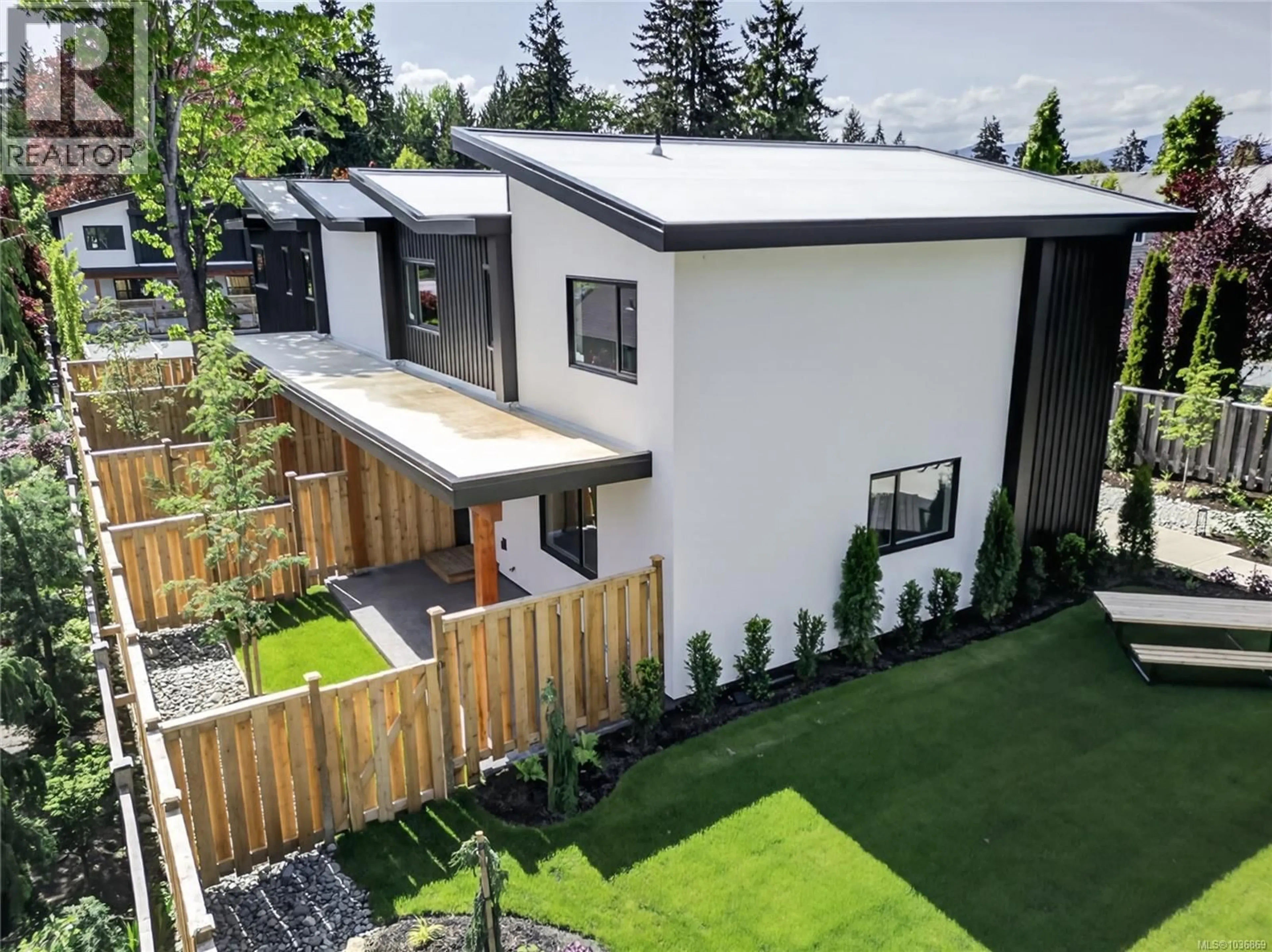 A pic from outside/outdoor area/front of a property/back of a property/a pic from drone, unknown for 6 - 1590 PIERCY AVENUE, Courtenay British Columbia V9N3E9
