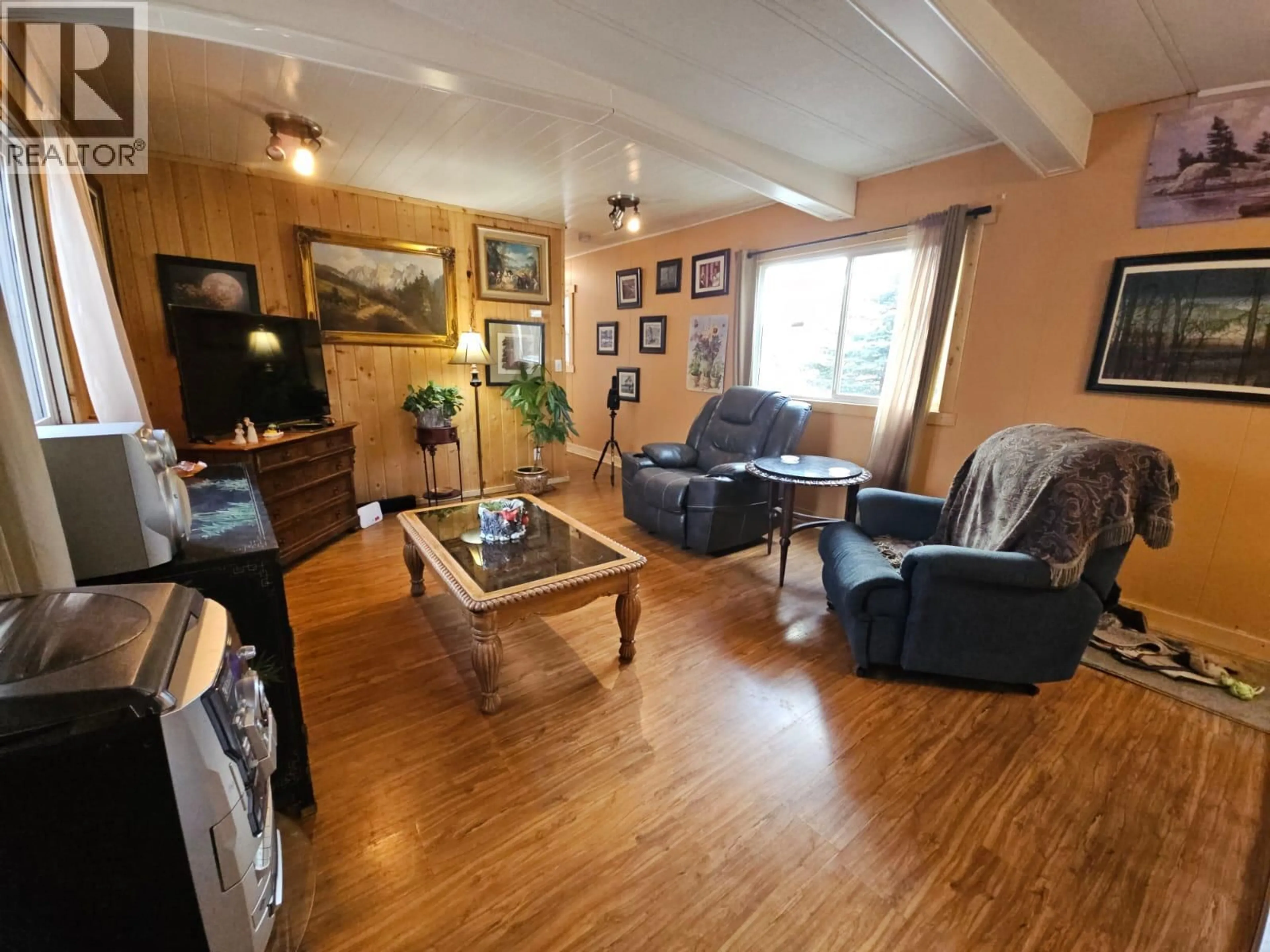 Living room with furniture, wood/laminate floor for 2658 CLARK DRIVE, Chetwynd British Columbia V0C1J0