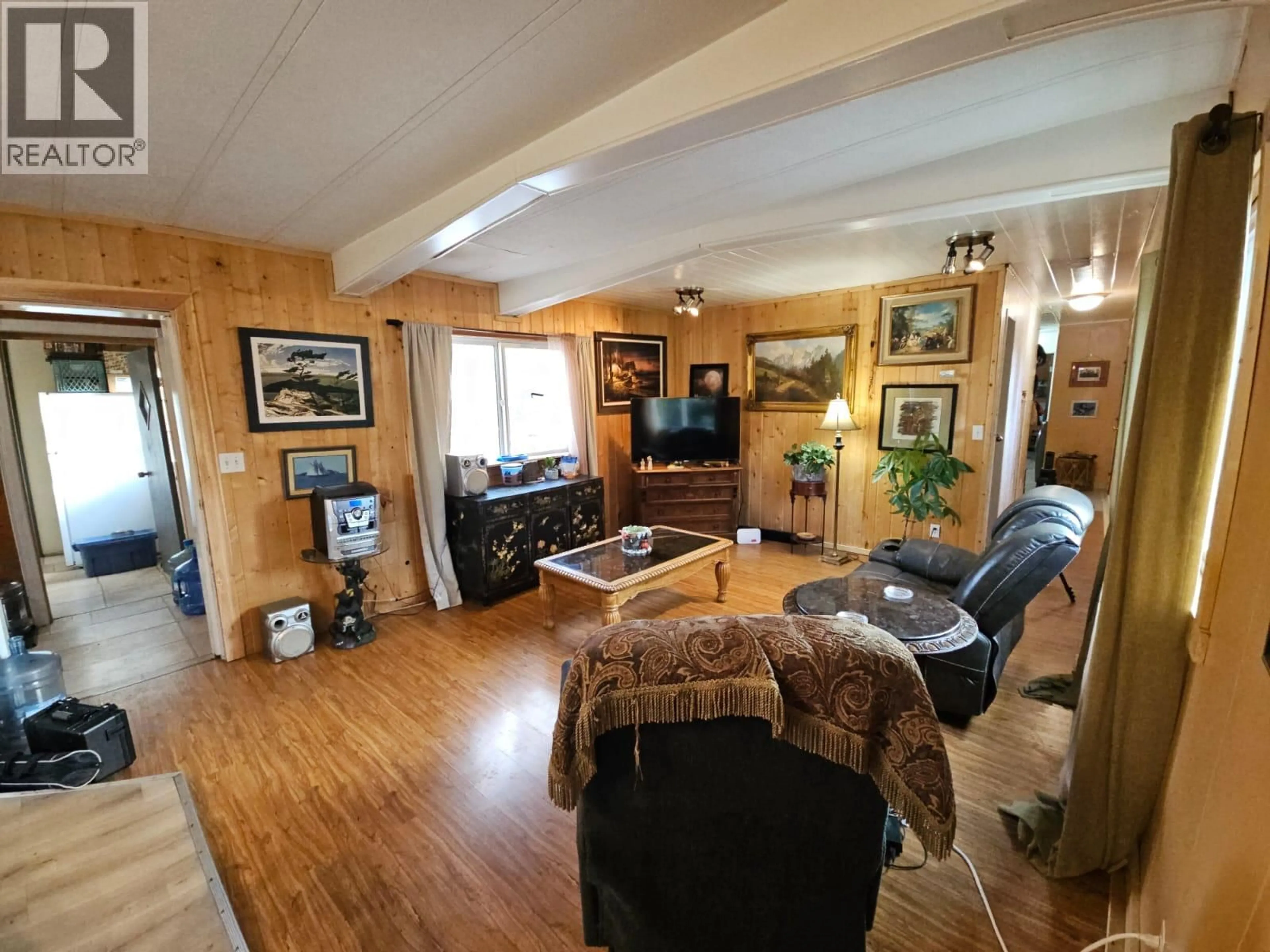 Living room with furniture, wood/laminate floor for 2658 CLARK DRIVE, Chetwynd British Columbia V0C1J0