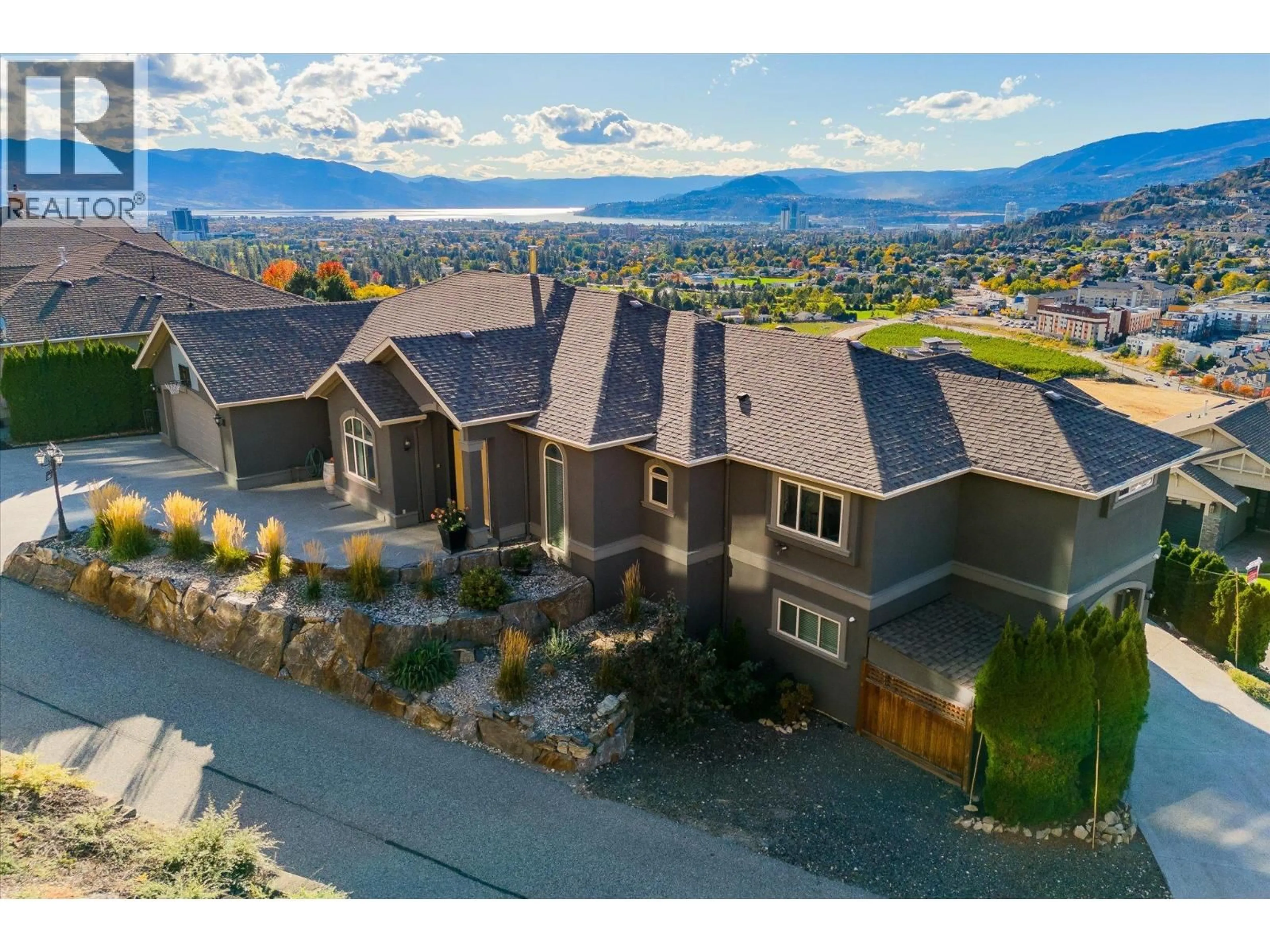 A pic from outside/outdoor area/front of a property/back of a property/a pic from drone, mountain view for 619 DENALI COURT, Kelowna British Columbia V1V2P6