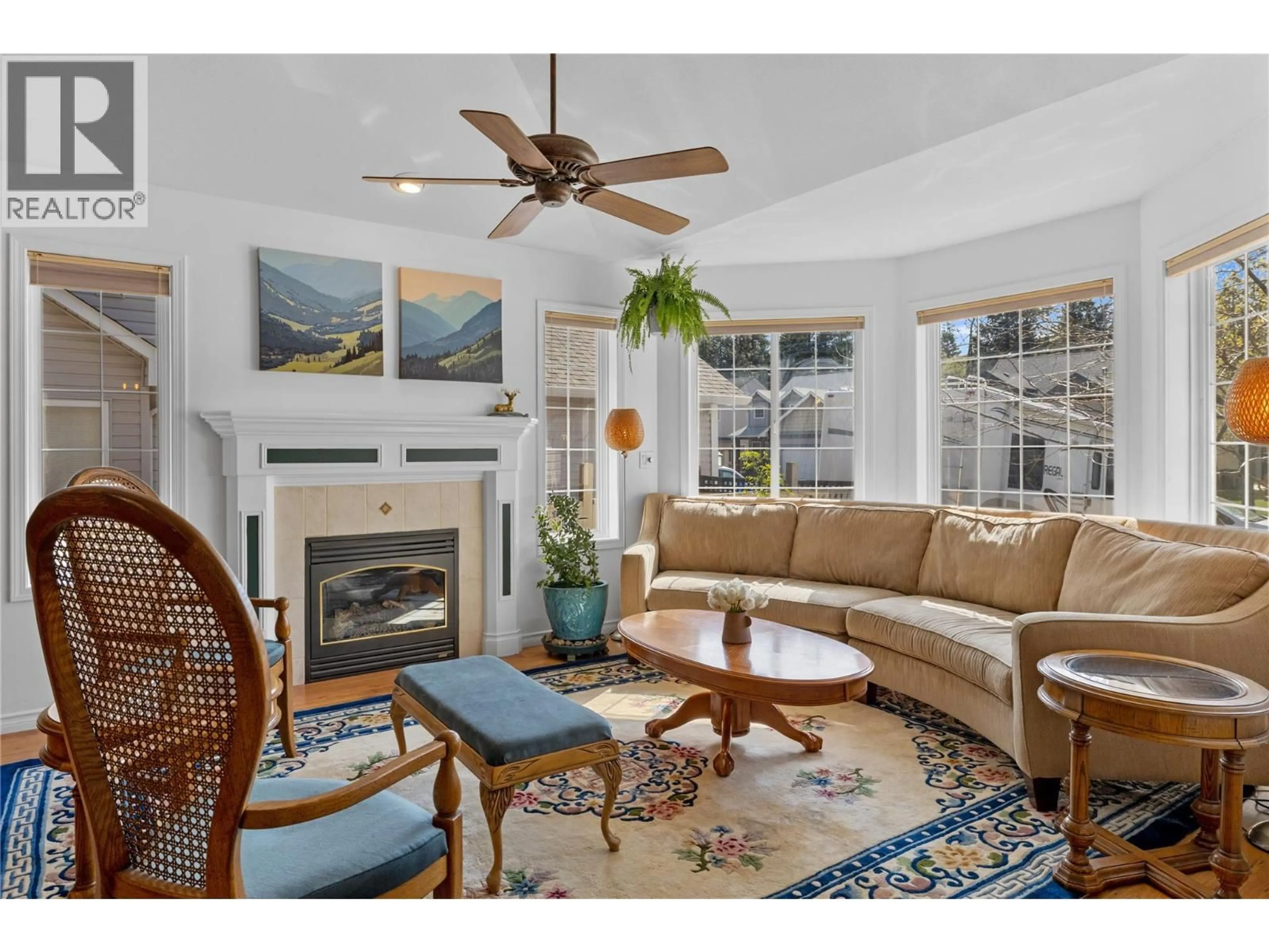 Living room with furniture, ceramic/tile floor for 1474 ROSE MEADOW DRIVE, West Kelowna British Columbia V1Z4A3