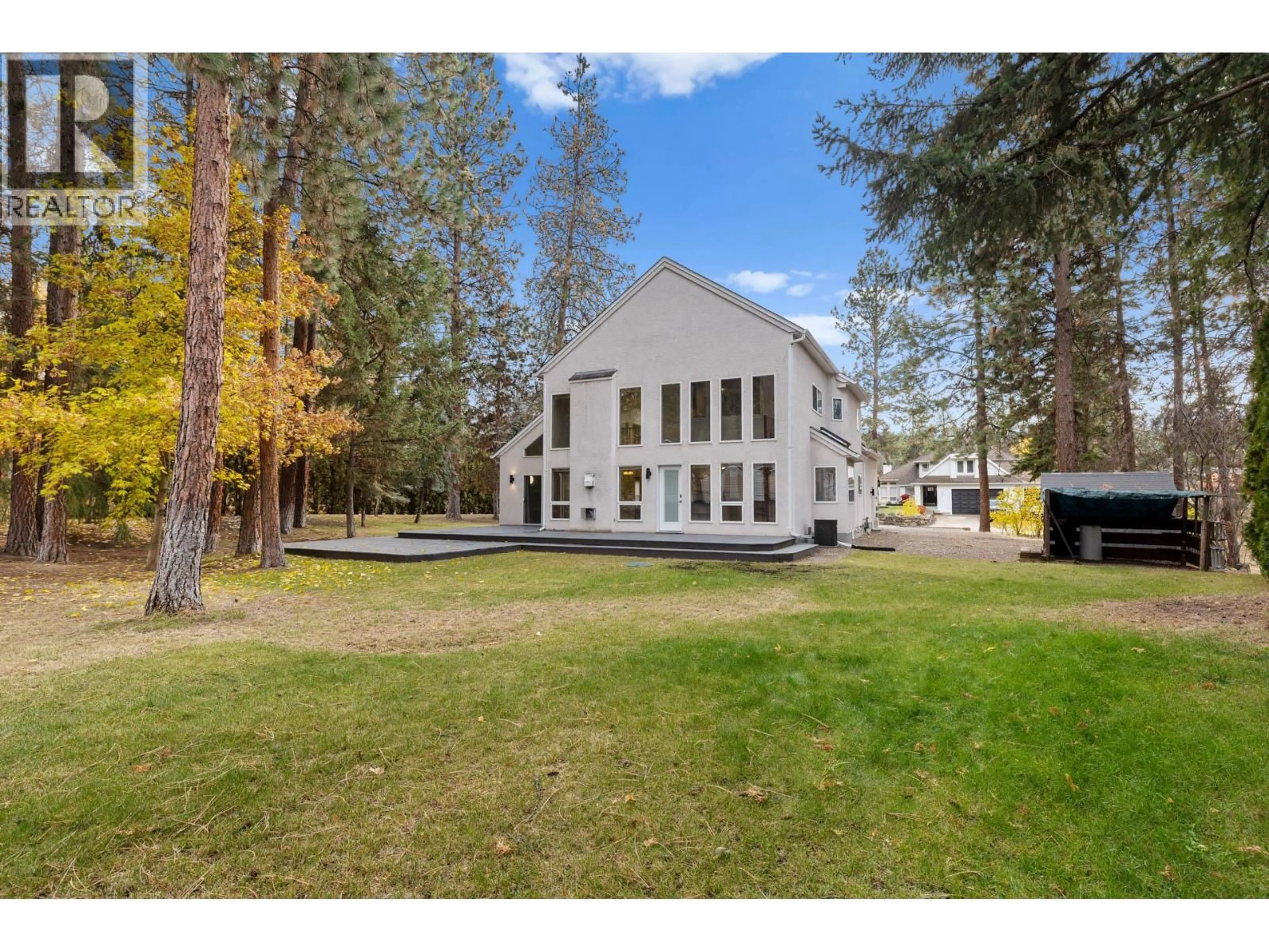 A pic from outside/outdoor area/front of a property/back of a property/a pic from drone, unknown for 3932 LAKEVALE PLACE, Kelowna British Columbia V1W3Z5