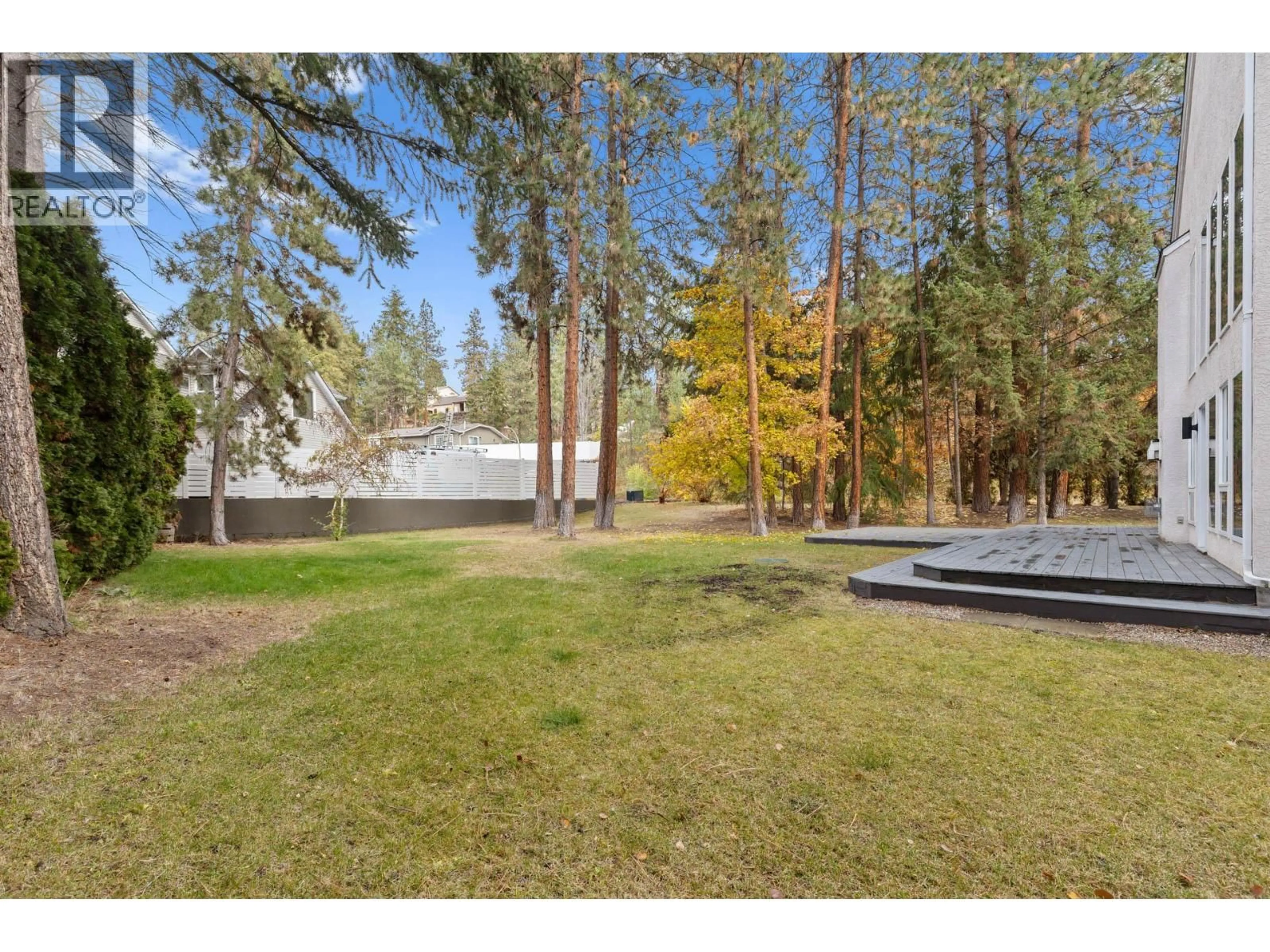 A pic from outside/outdoor area/front of a property/back of a property/a pic from drone, forest/trees view for 3932 LAKEVALE PLACE, Kelowna British Columbia V1W3Z5