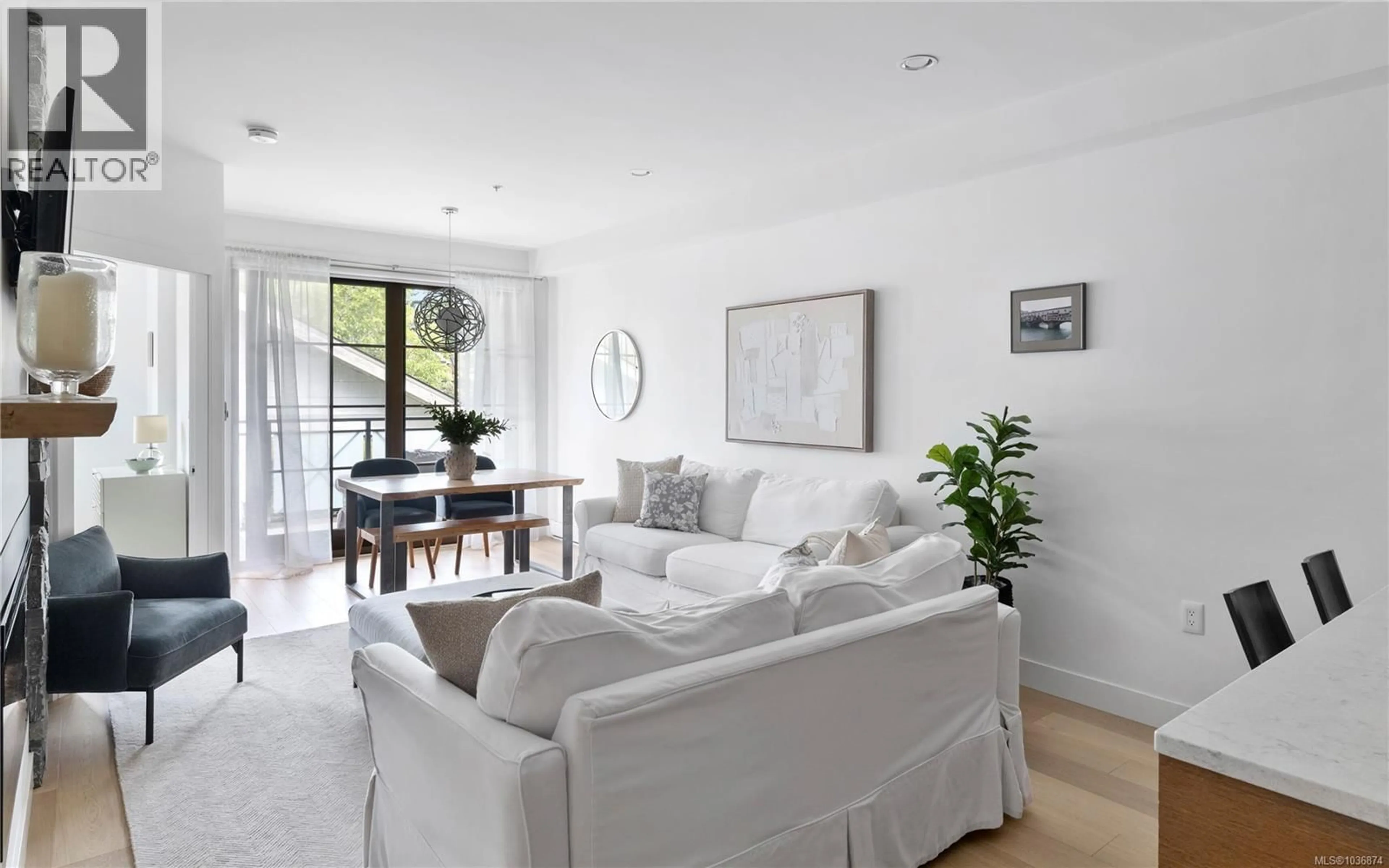 Living room with furniture, unknown for 202 - 2580 PENRHYN STREET, Saanich British Columbia V8N1G3