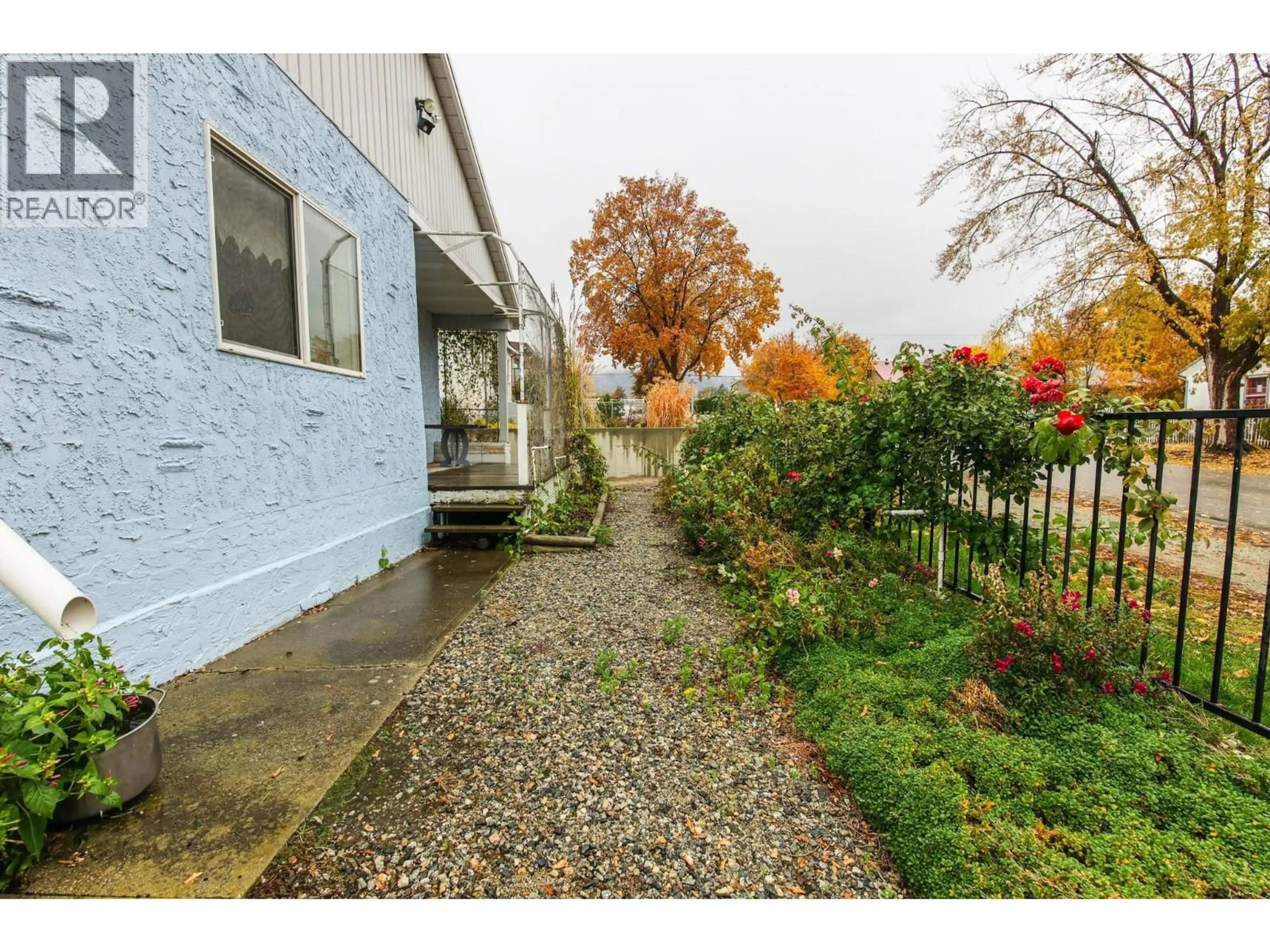 A pic from outside/outdoor area/front of a property/back of a property/a pic from drone, street for 8507 72 ND AVENUE, Osoyoos British Columbia V0H1V0