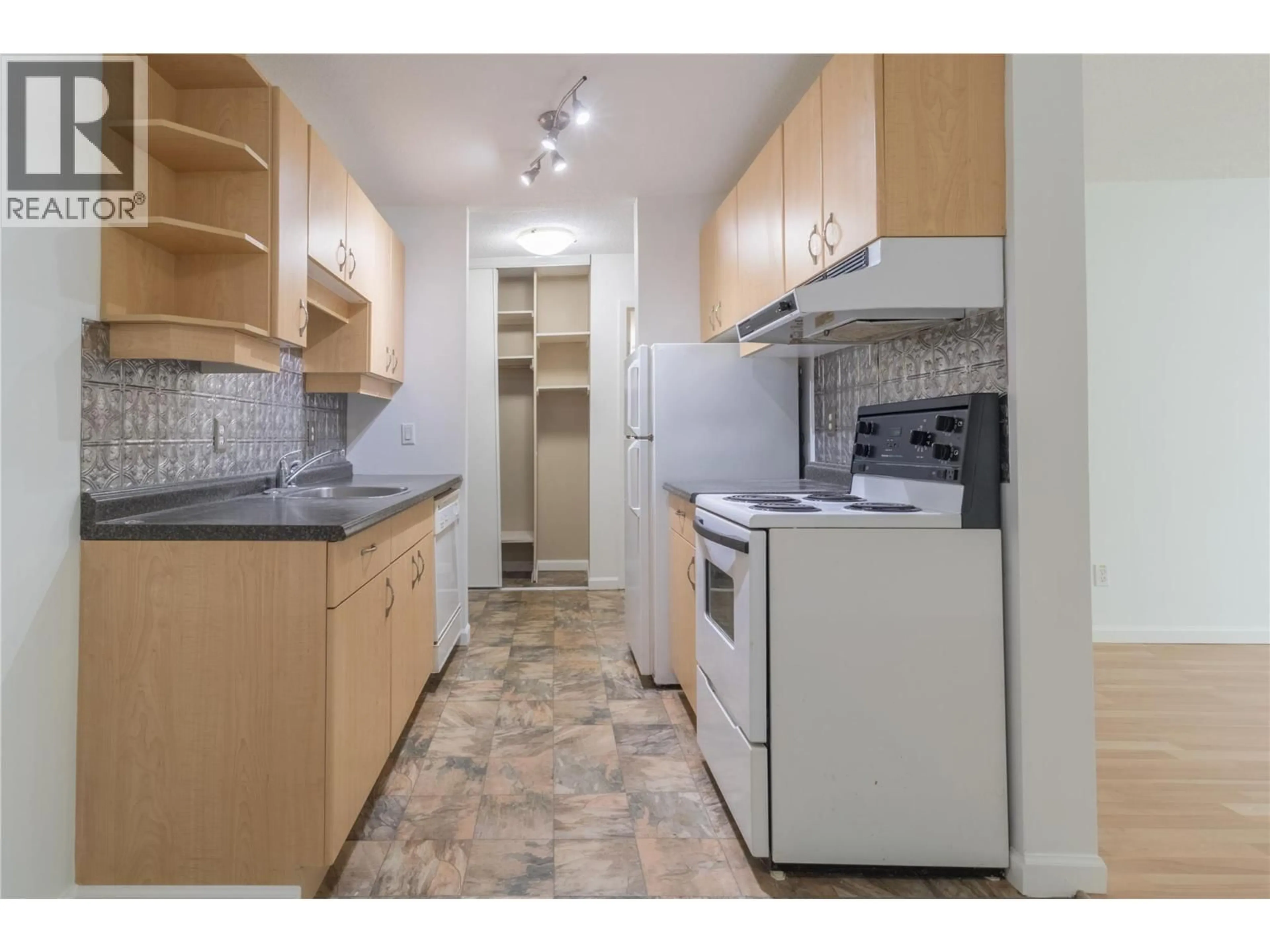 Standard kitchen, unknown for 106 - 445 ALL STAR COURT, Kelowna British Columbia V1X5N7