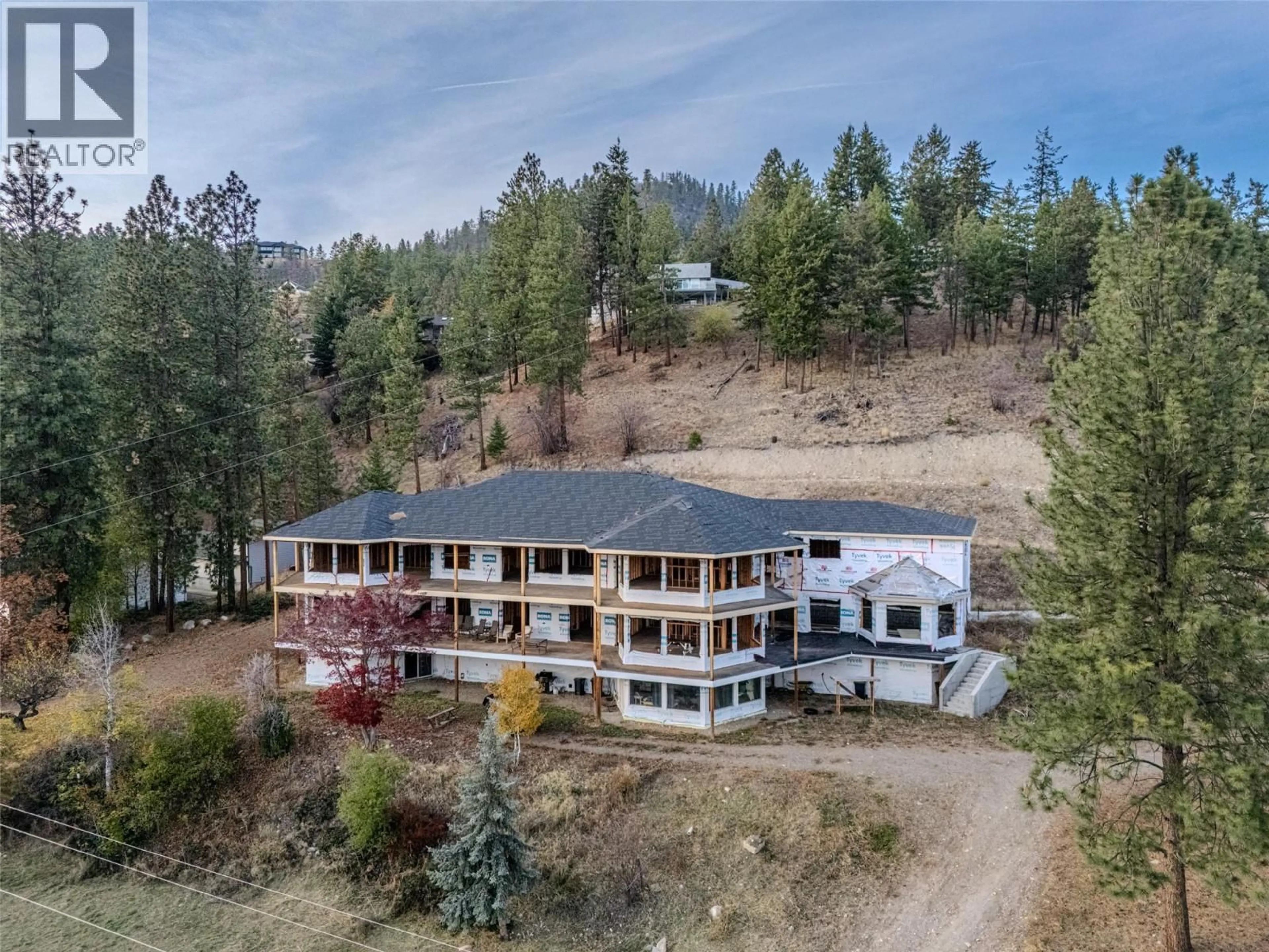 A pic from outside/outdoor area/front of a property/back of a property/a pic from drone, mountain view for 4976 PRINCETON AVENUE, Peachland British Columbia V0H1X8