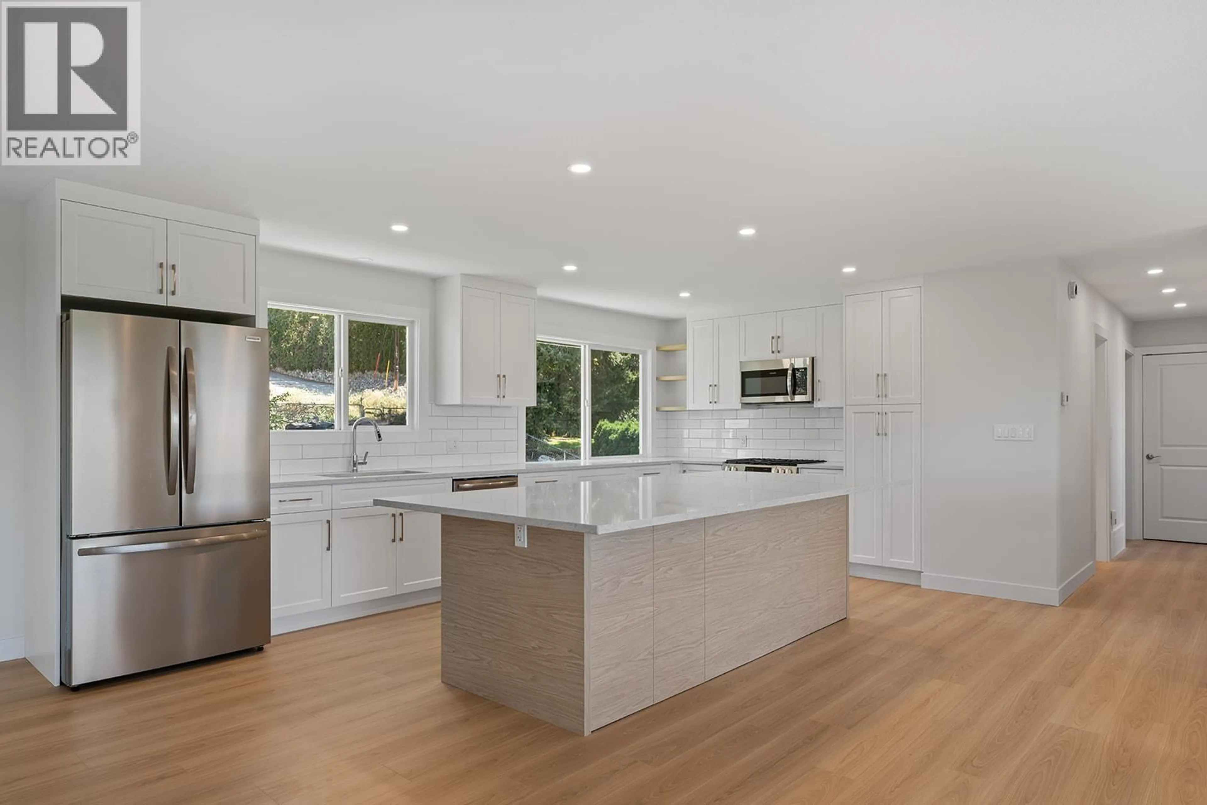 Open concept kitchen, unknown for 1175 HILLCREST ROAD, Kelowna British Columbia V1P1B7