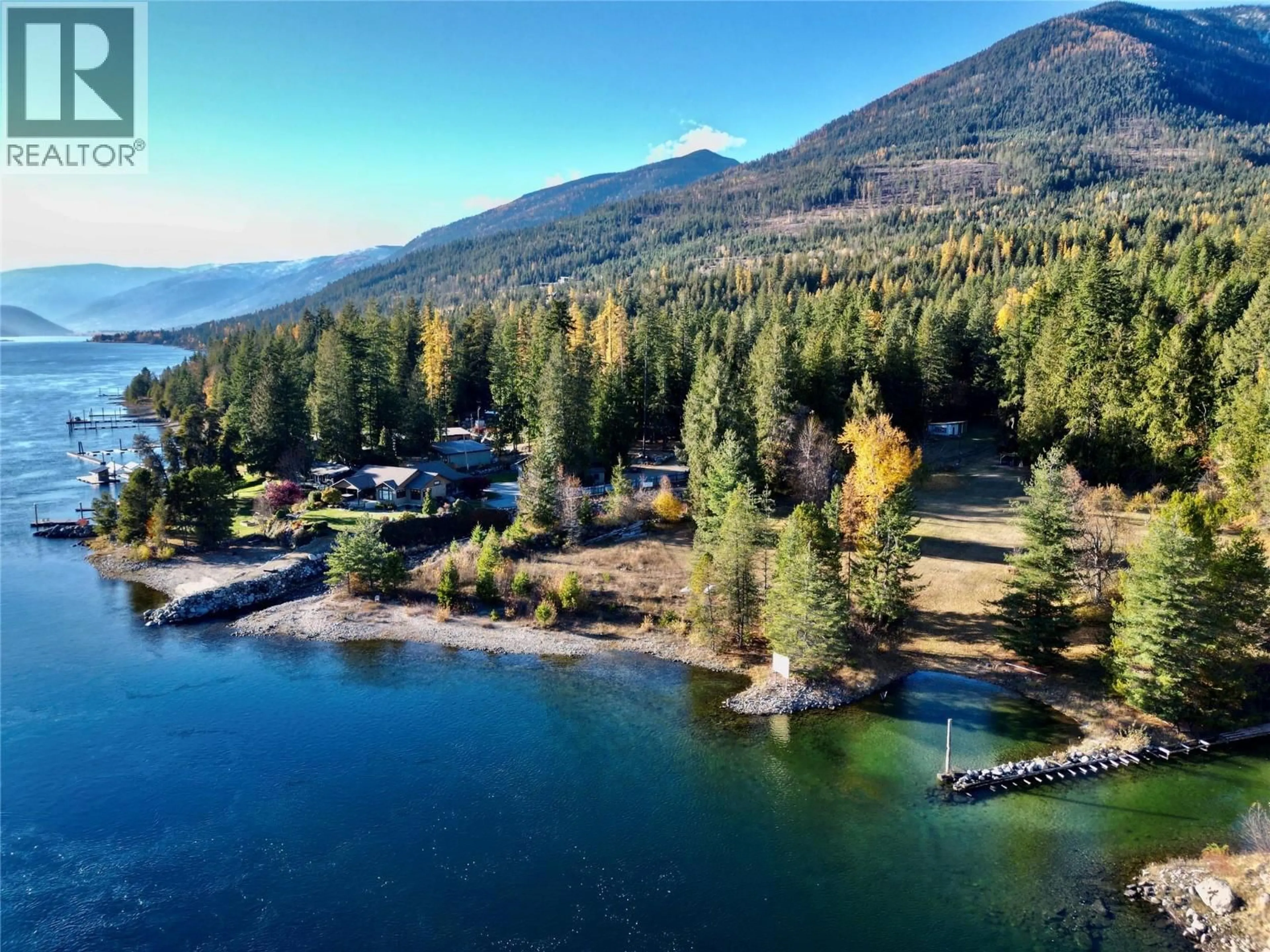 A pic from outside/outdoor area/front of a property/back of a property/a pic from drone, water/lake/river/ocean view for 7096 HIGHWAY 3A HIGHWAY, Nelson British Columbia V1L6R9