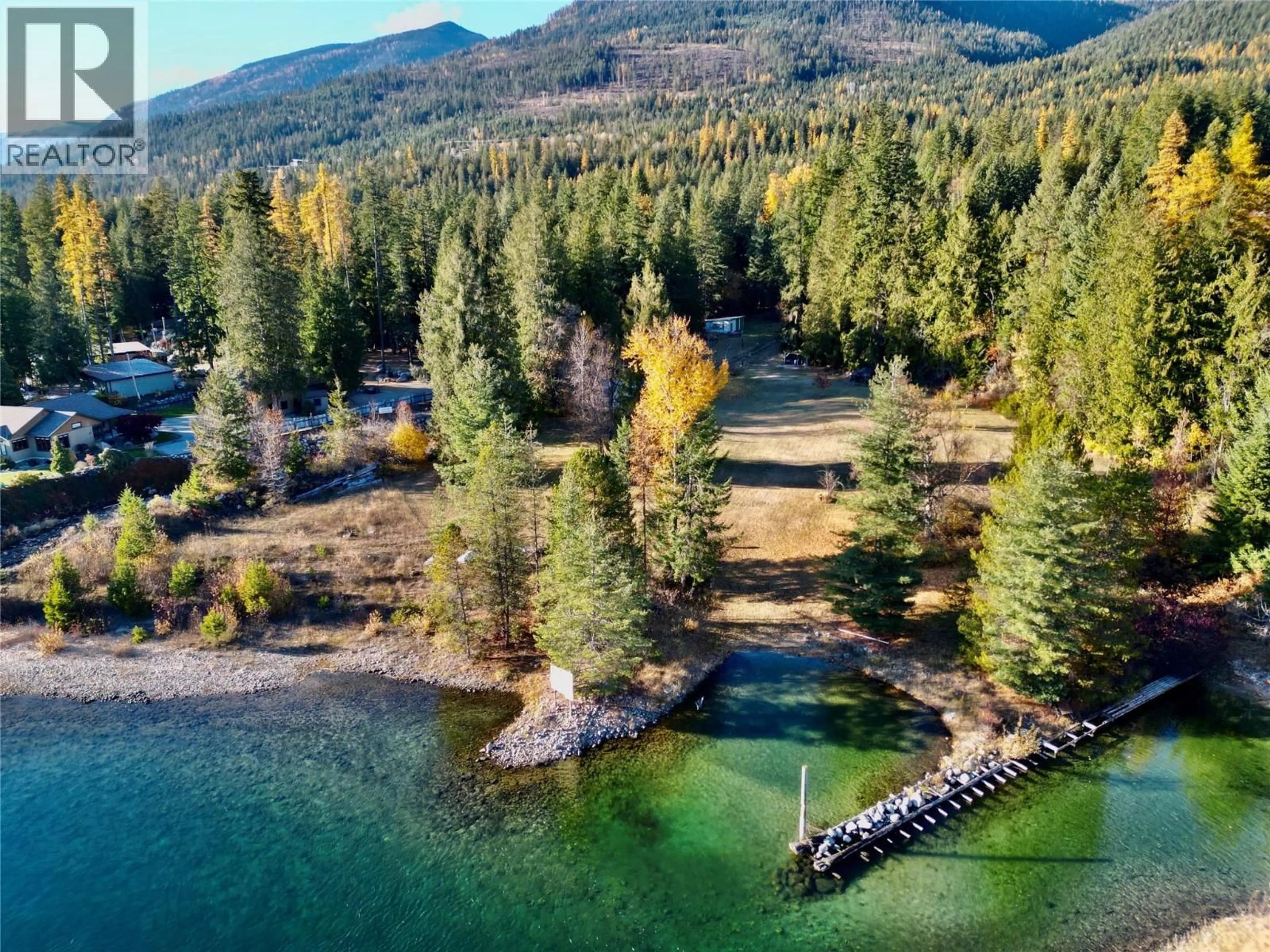 A pic from outside/outdoor area/front of a property/back of a property/a pic from drone, water/lake/river/ocean view for 7096 HIGHWAY 3A HIGHWAY, Nelson British Columbia V1L6R9
