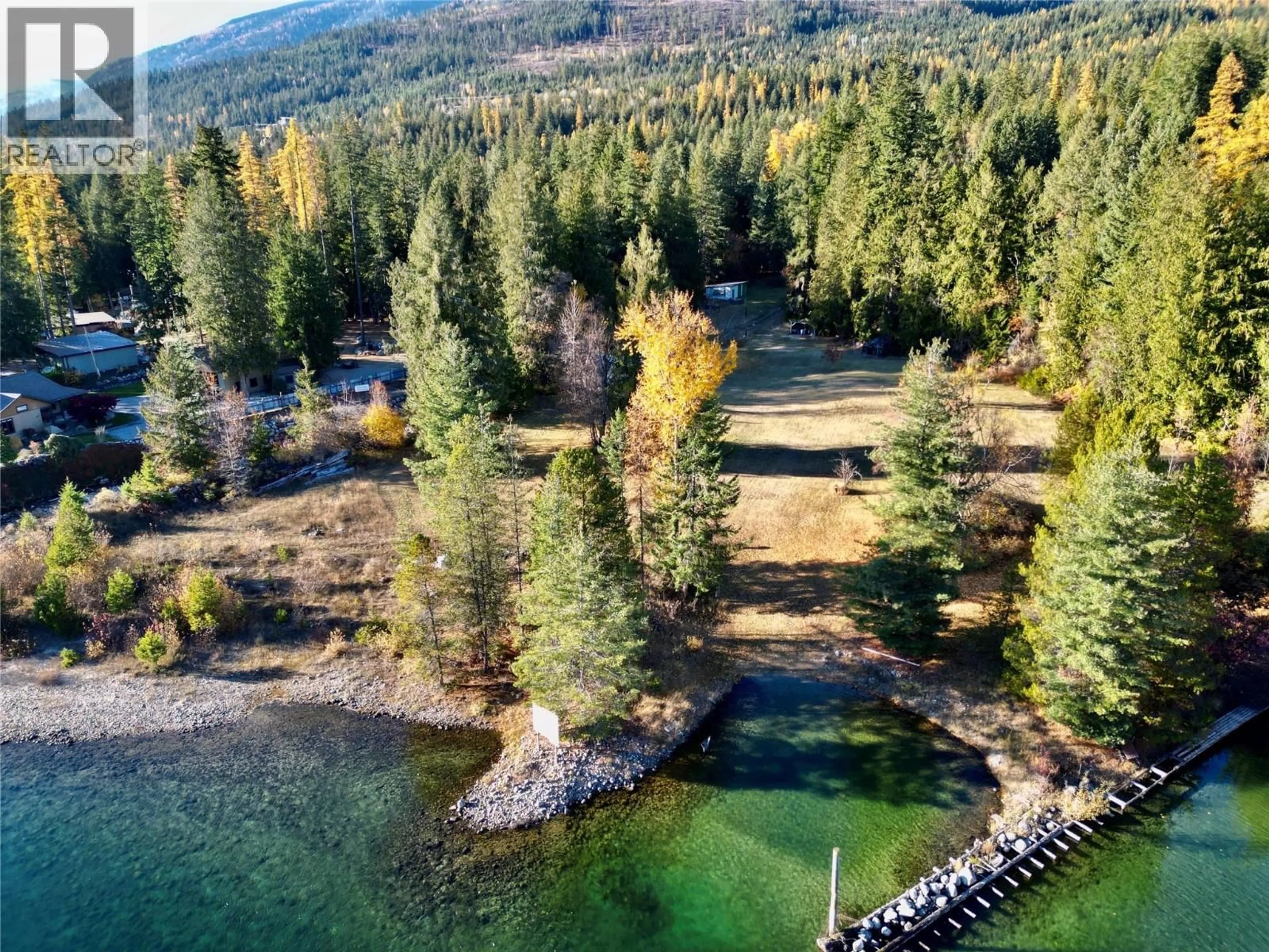 A pic from outside/outdoor area/front of a property/back of a property/a pic from drone, water/lake/river/ocean view for 7096 HIGHWAY 3A HIGHWAY, Nelson British Columbia V1L6R9