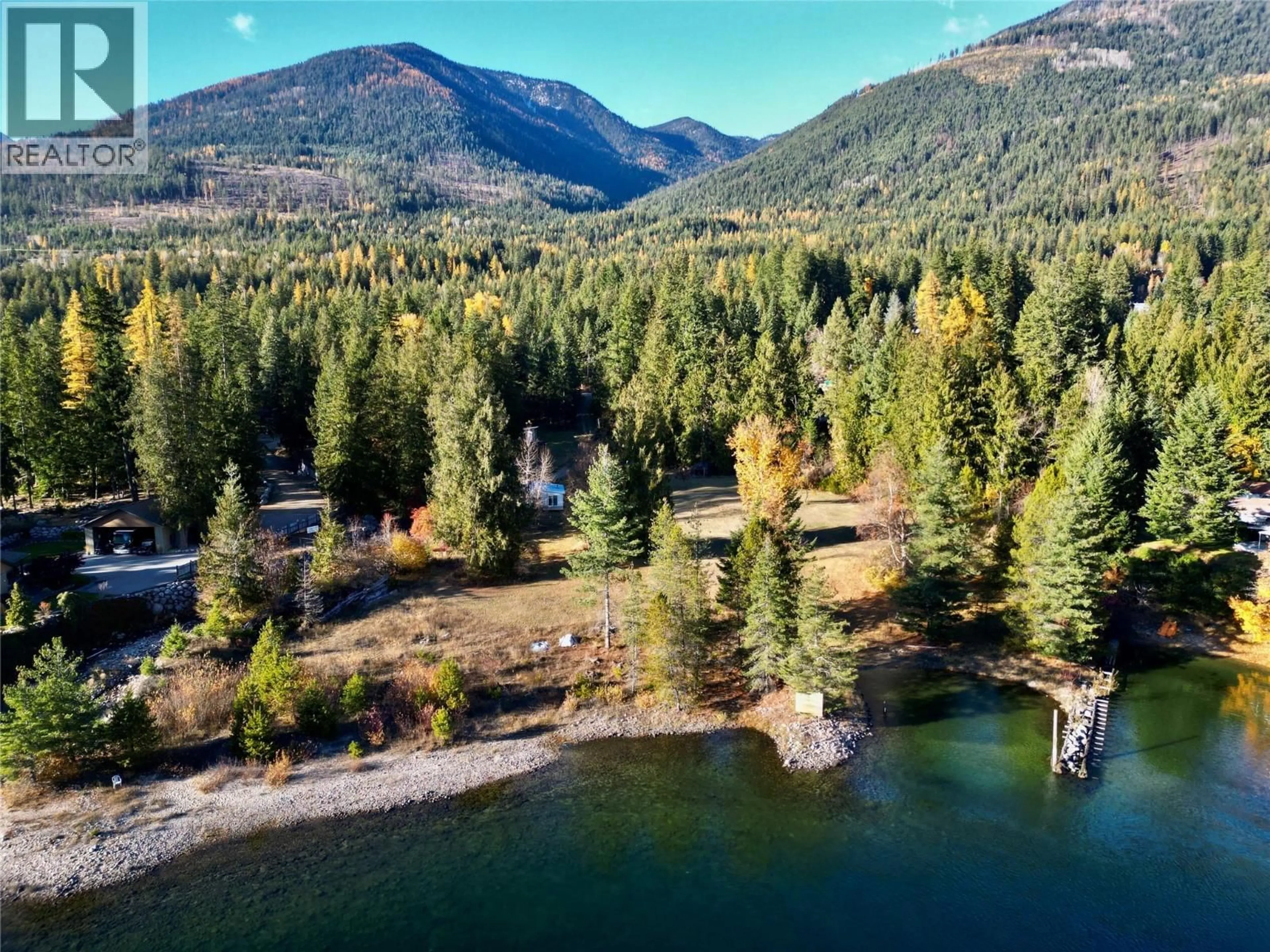 A pic from outside/outdoor area/front of a property/back of a property/a pic from drone, water/lake/river/ocean view for 7096 HIGHWAY 3A HIGHWAY, Nelson British Columbia V1L6R9