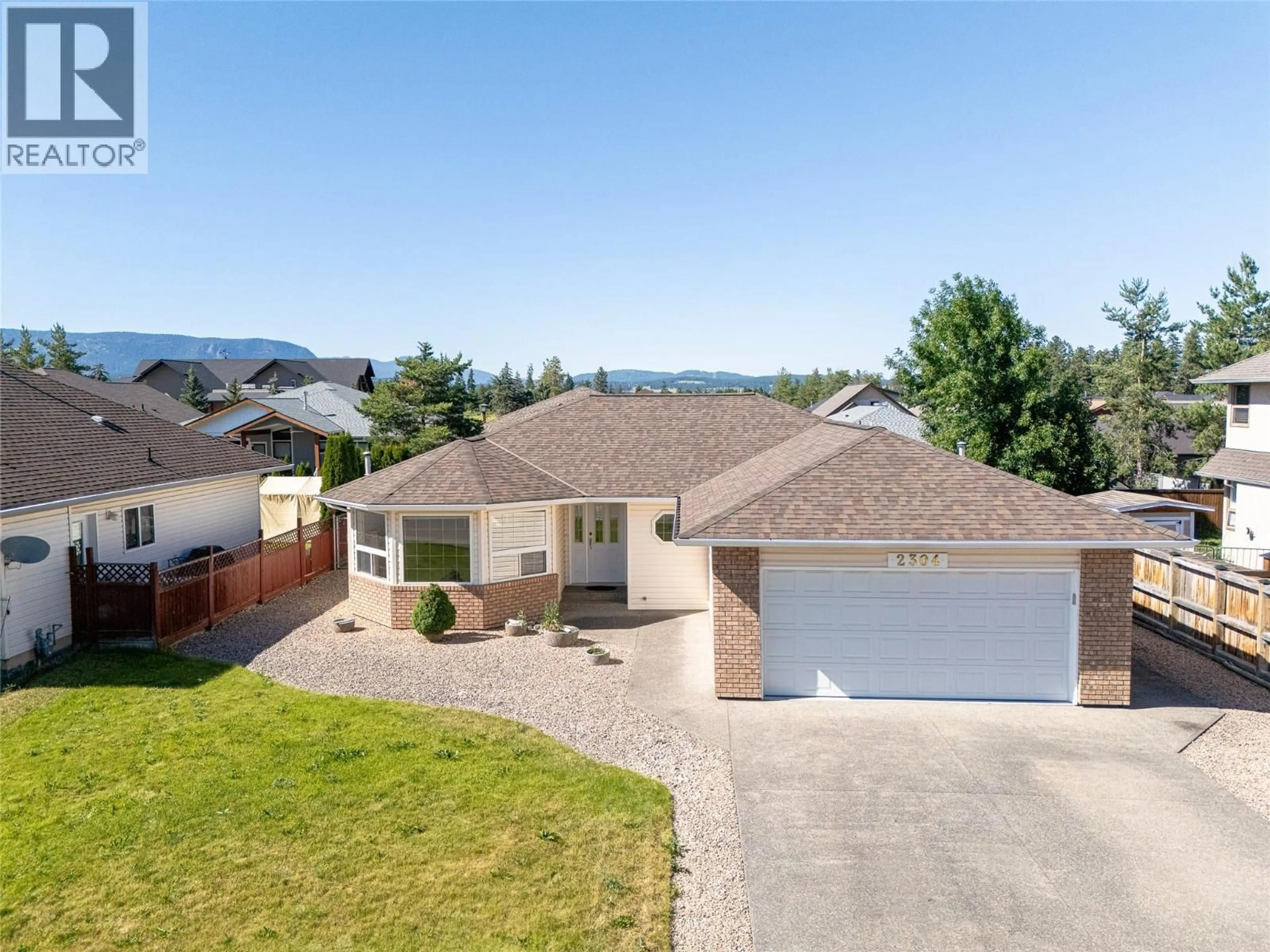 A pic from outside/outdoor area/front of a property/back of a property/a pic from drone, street for 2304 BRADLEY DRIVE, Armstrong British Columbia V0E1B1