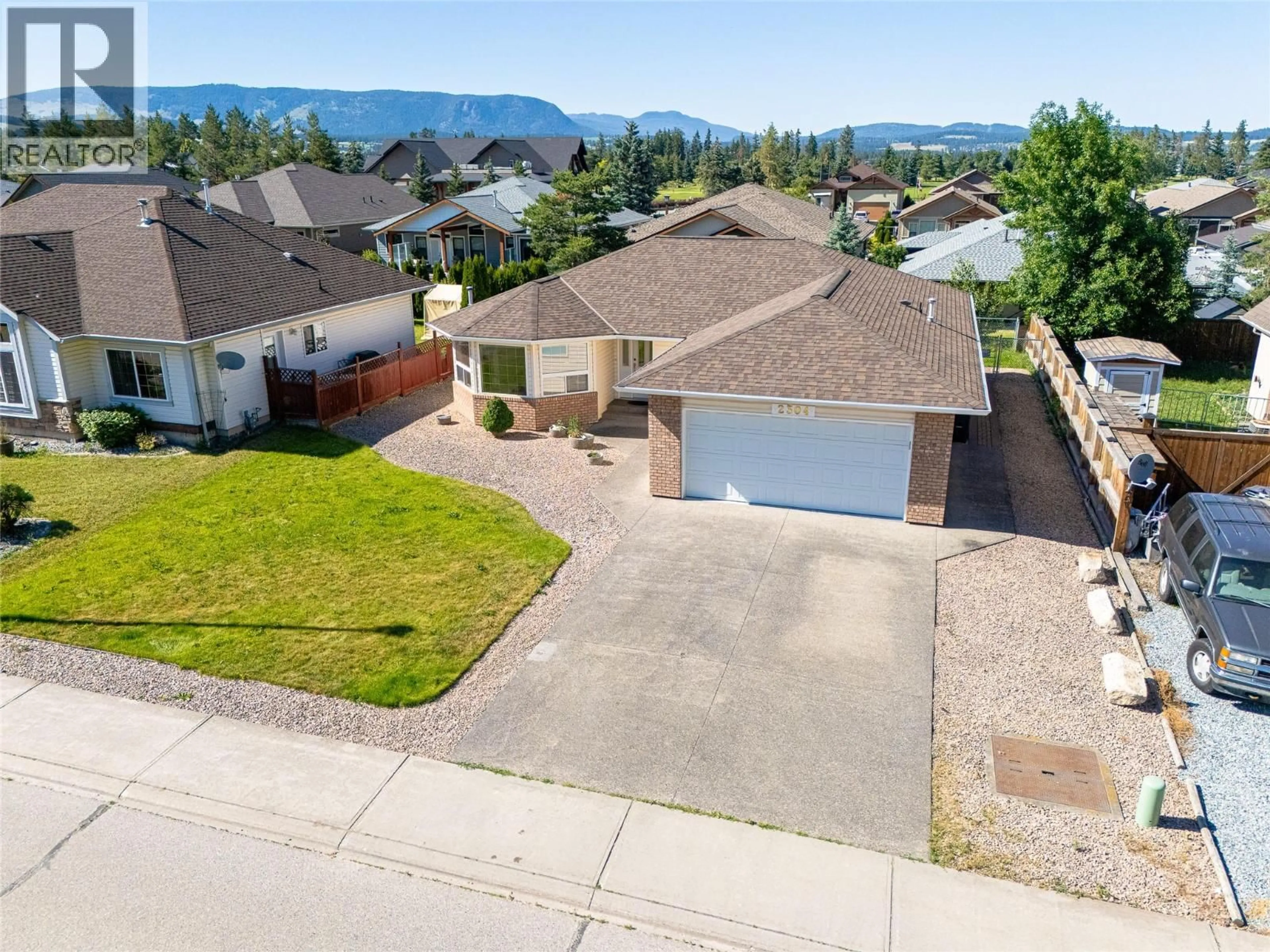 A pic from outside/outdoor area/front of a property/back of a property/a pic from drone, street for 2304 BRADLEY DRIVE, Armstrong British Columbia V0E1B1