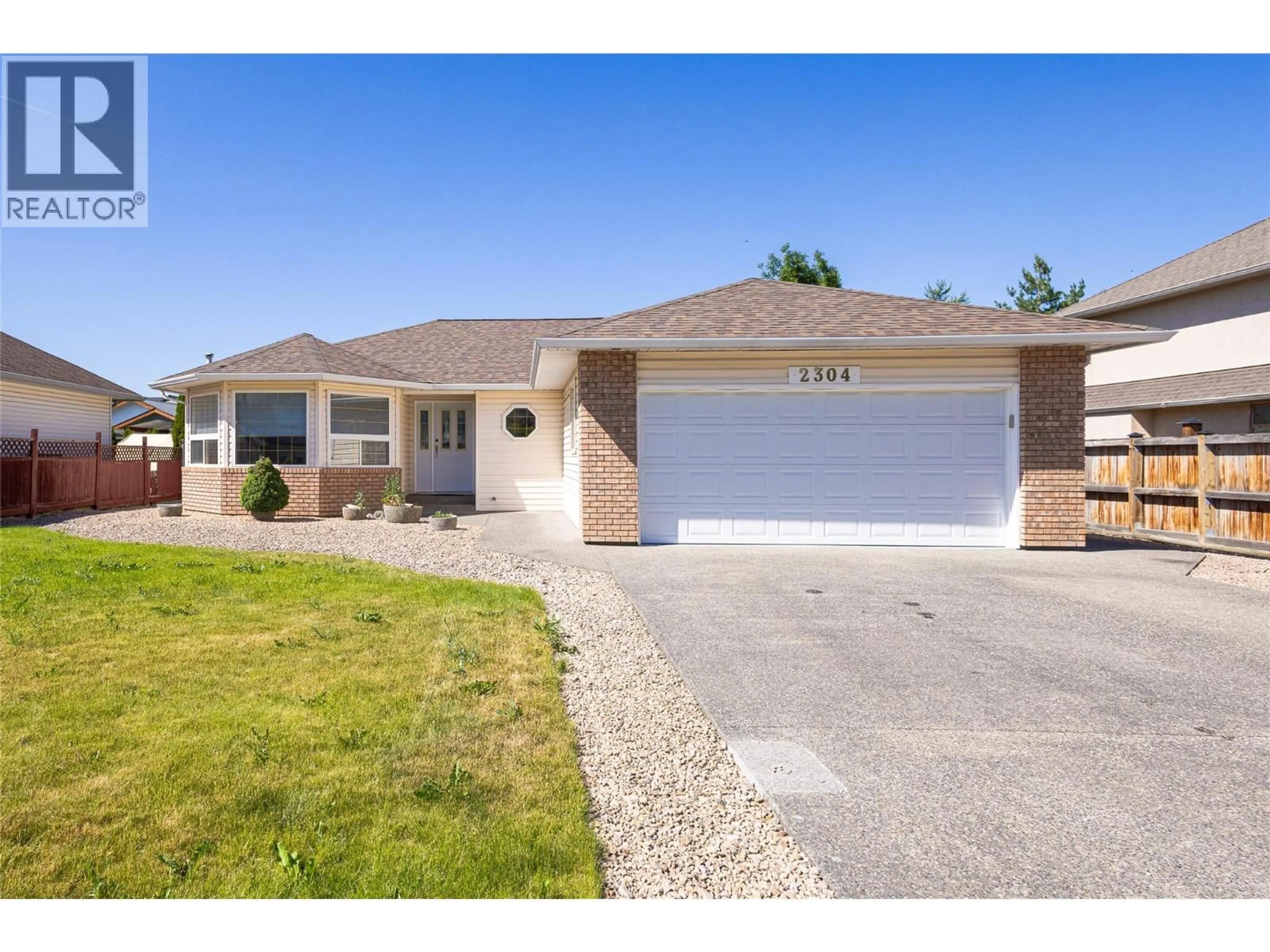 Home with vinyl exterior material, street for 2304 BRADLEY DRIVE, Armstrong British Columbia V0E1B1