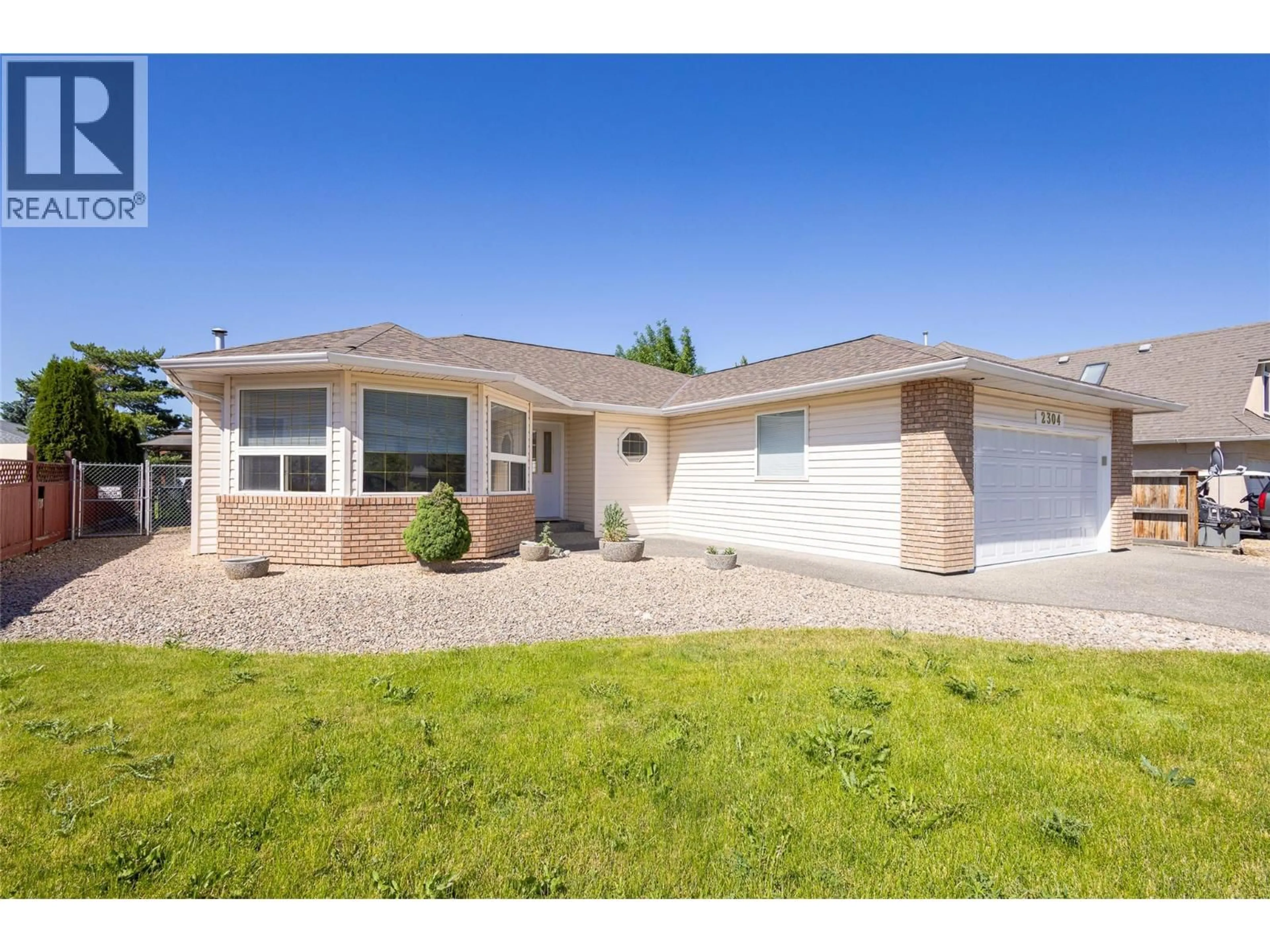 Home with vinyl exterior material, street for 2304 BRADLEY DRIVE, Armstrong British Columbia V0E1B1