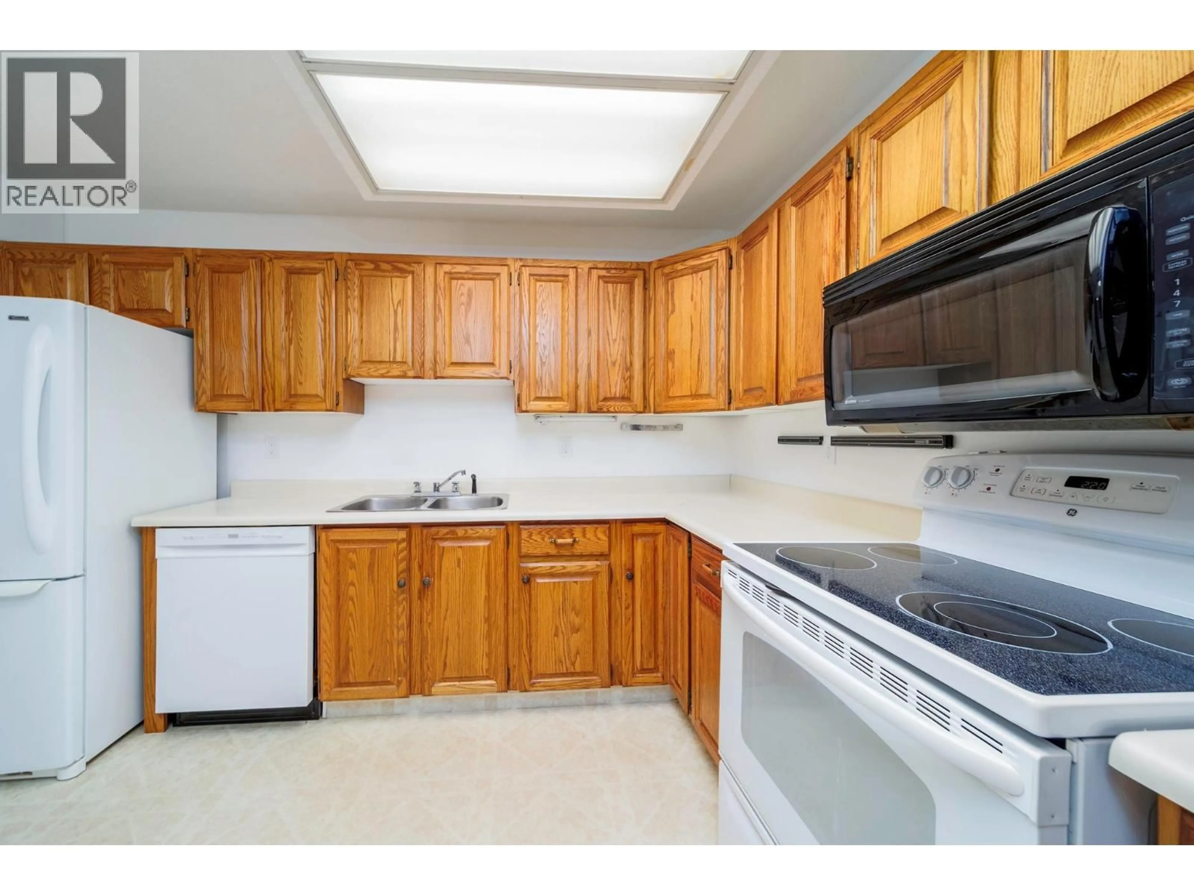 Standard kitchen, unknown for 101 - 1055 GLENWOOD AVENUE, Kelowna British Columbia V1Y5M8