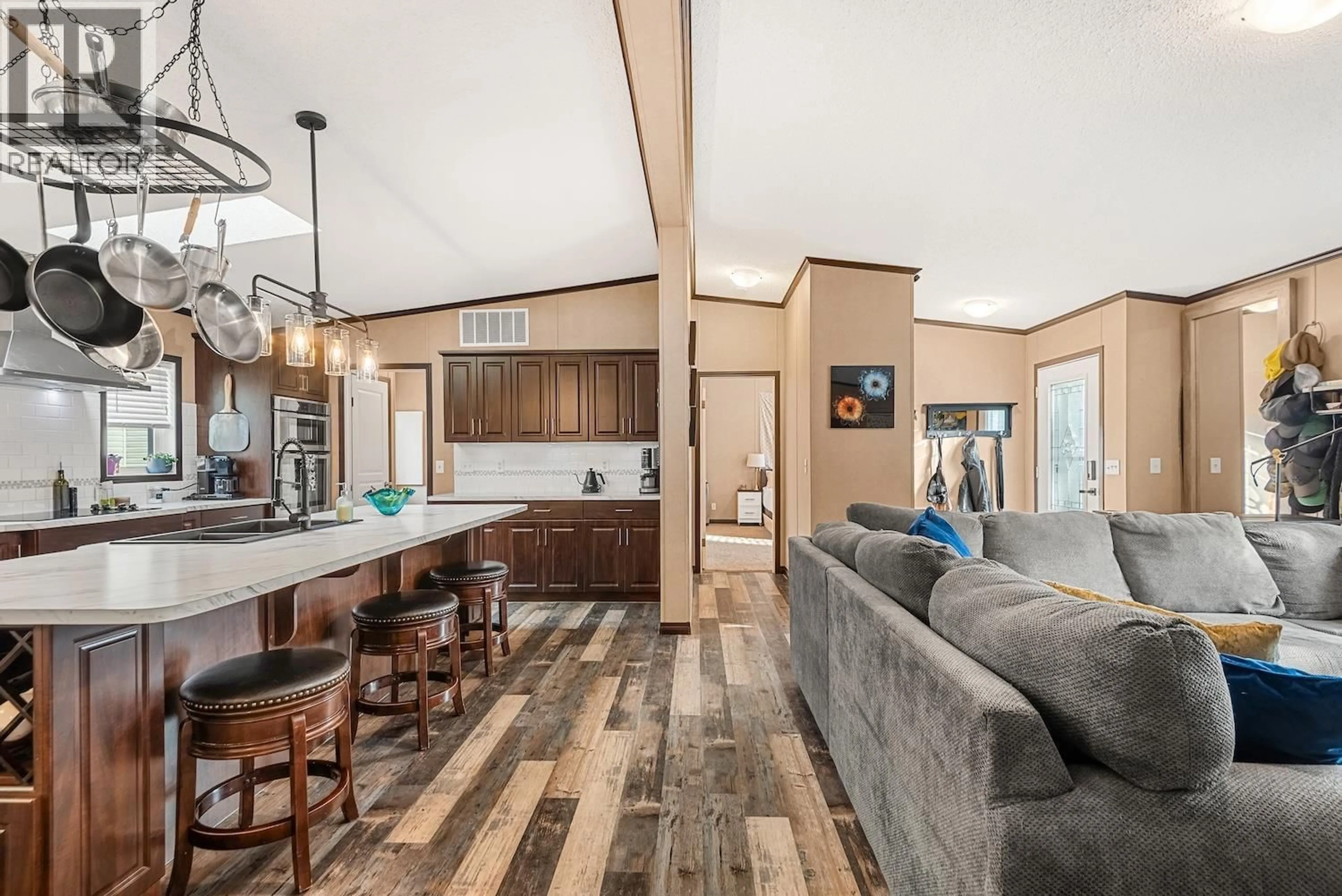 Open concept kitchen, wood/laminate floor for 13 DARBY CRESCENT, Elkford British Columbia v0b1h0