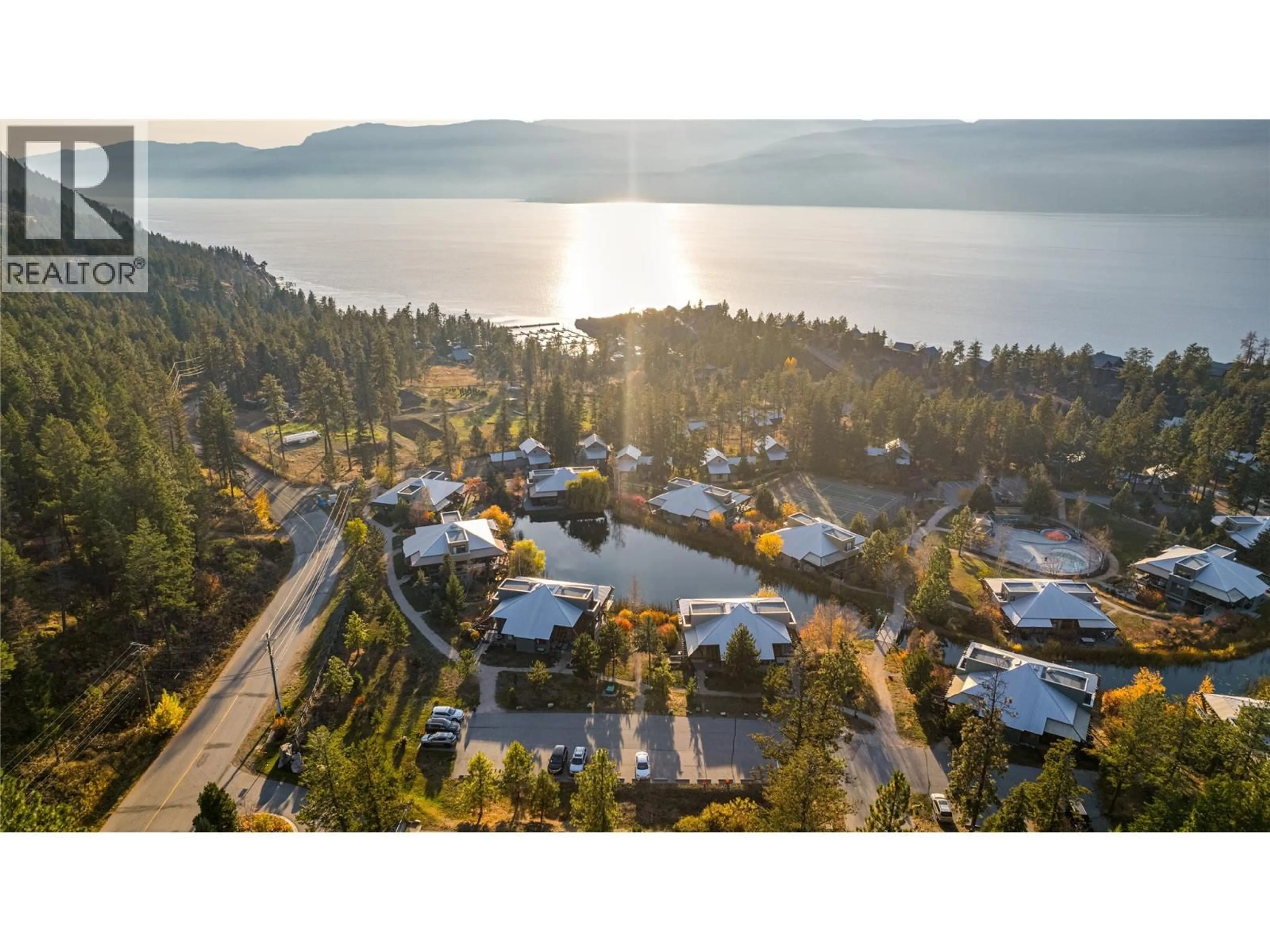 A pic from outside/outdoor area/front of a property/back of a property/a pic from drone, water/lake/river/ocean view for 79 - 9845 EASTSIDE ROAD, Vernon British Columbia V1H1Z2