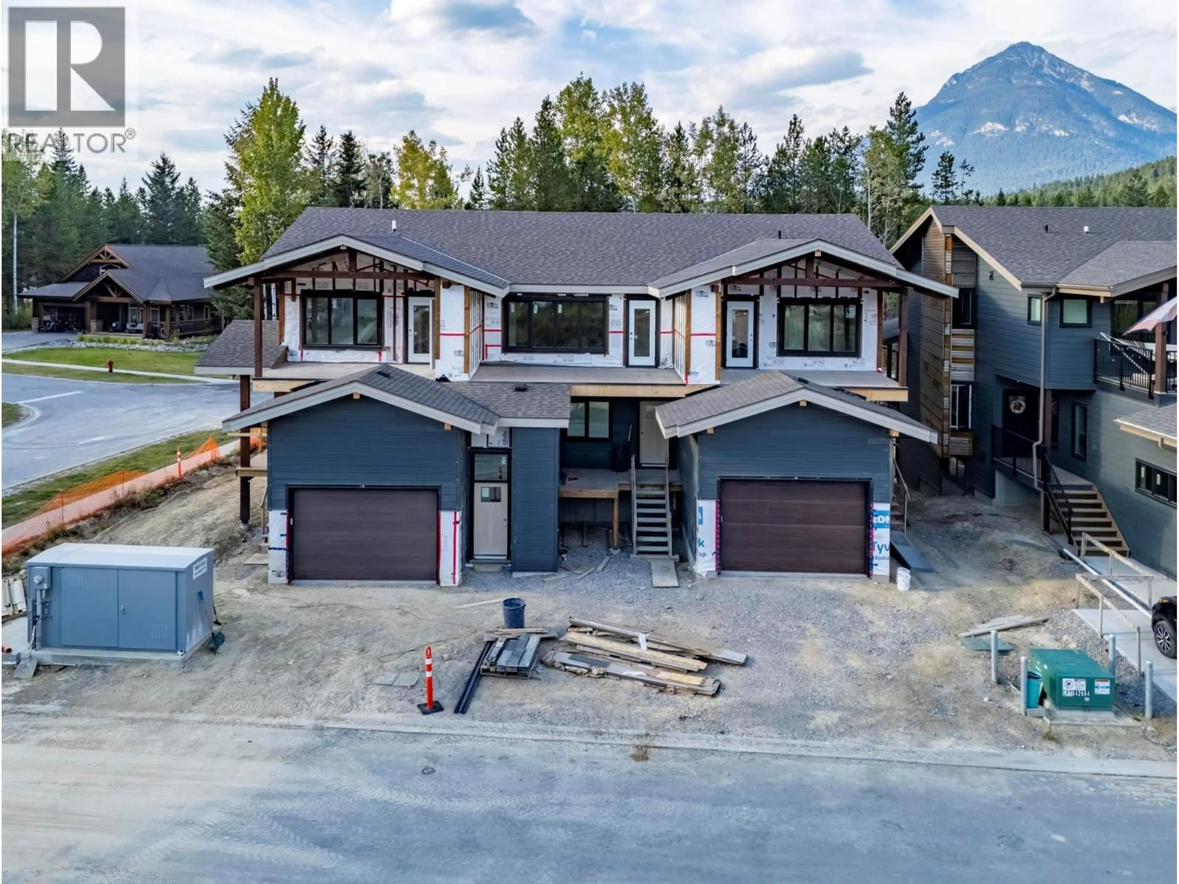 A pic from outside/outdoor area/front of a property/back of a property/a pic from drone, mountain view for 4 - 1444 GRANITE DRIVE, Golden British Columbia V0A1H0