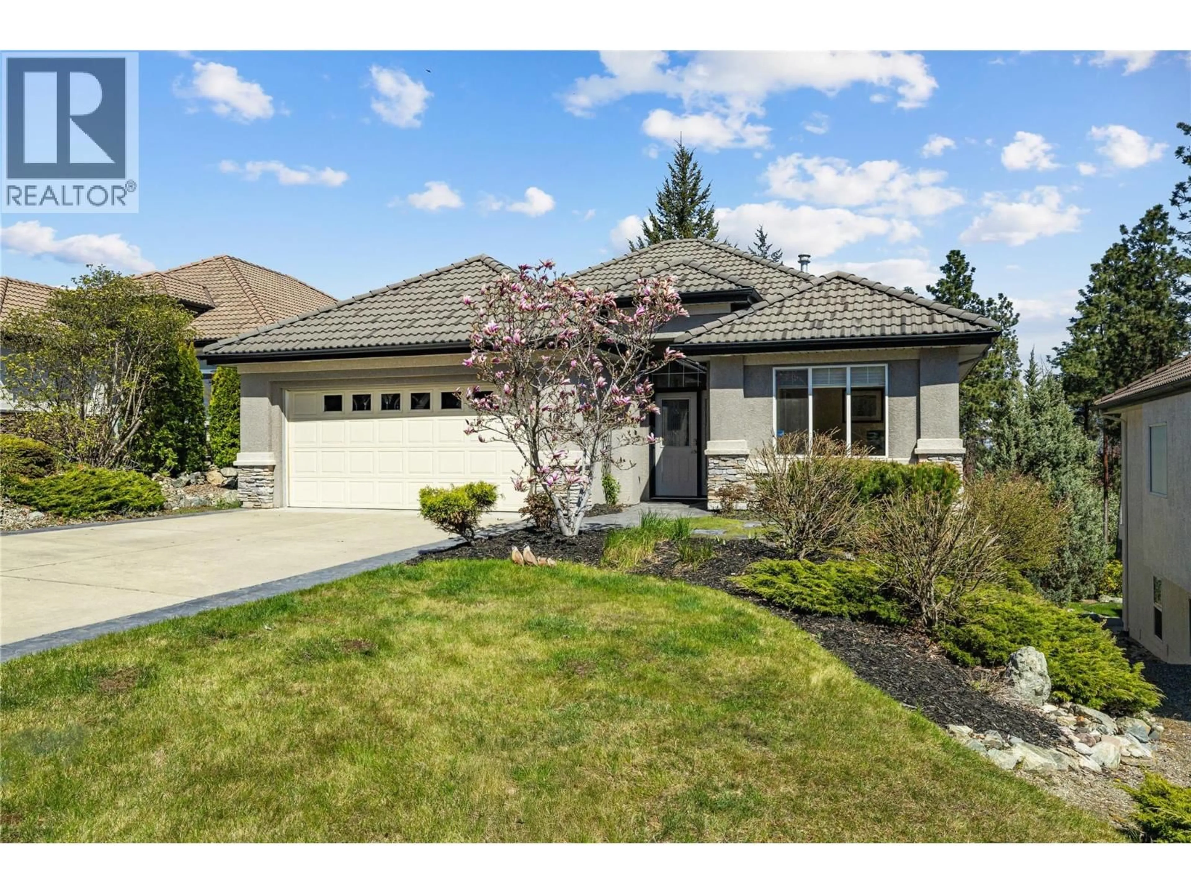 Home with vinyl exterior material, street for 103 - 1950 CAPISTRANO DRIVE, Kelowna British Columbia V1V2N7