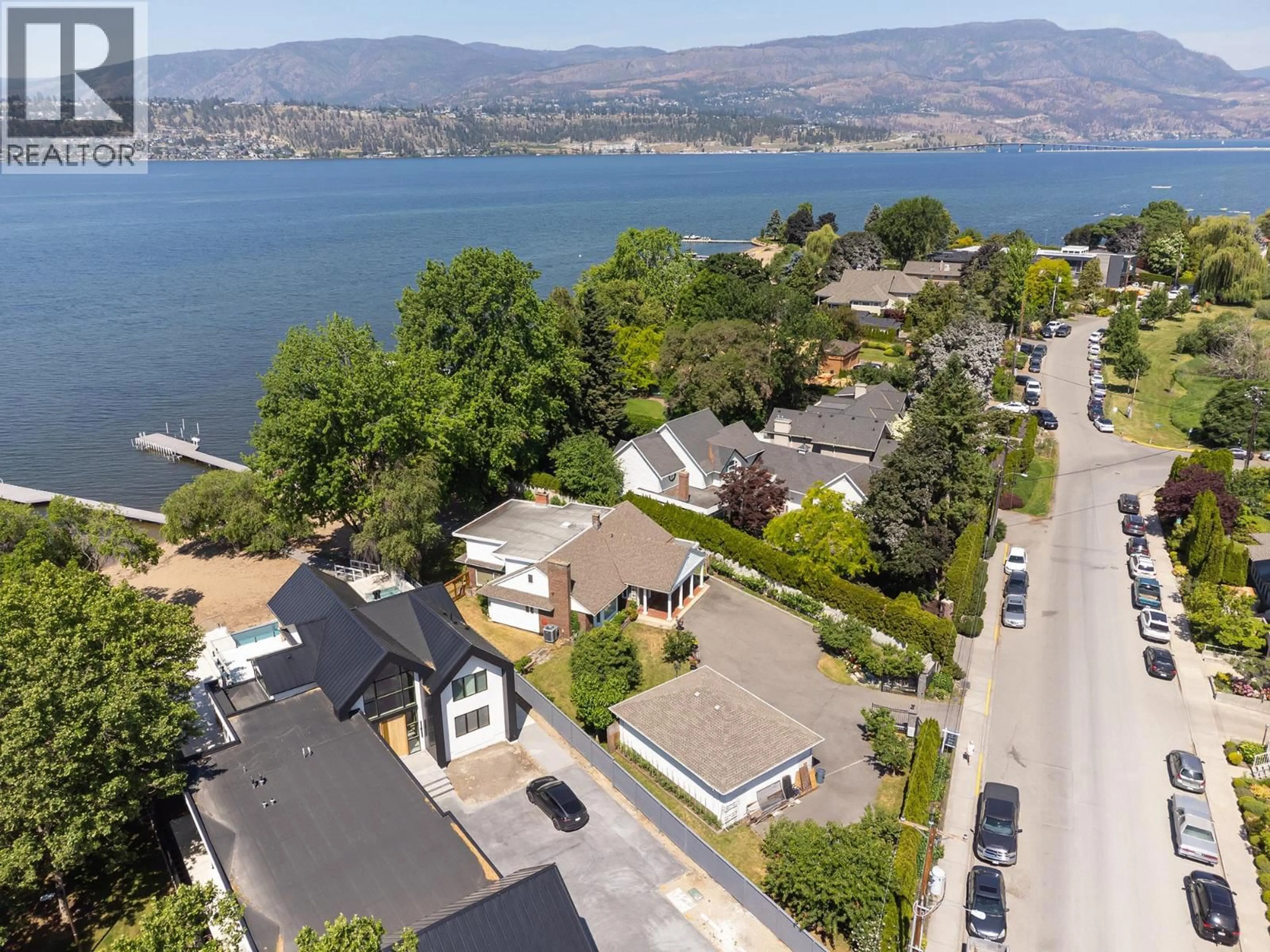 A pic from outside/outdoor area/front of a property/back of a property/a pic from drone, water/lake/river/ocean view for 3264 WATT ROAD, Kelowna British Columbia V1W3C8